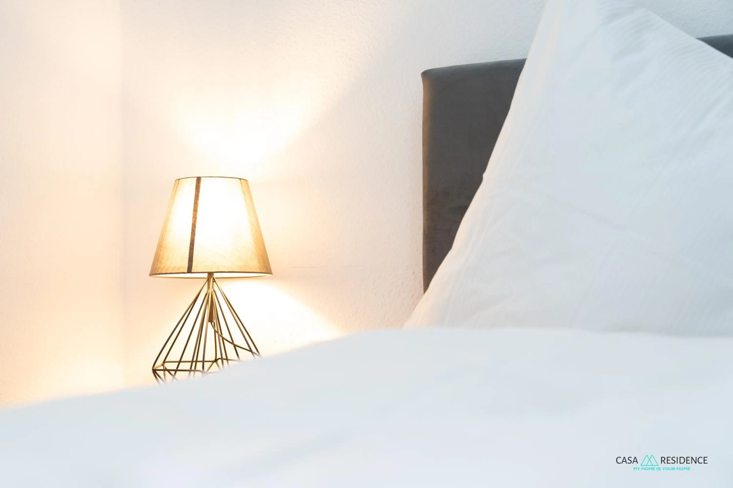 Bed in Louis Apartments