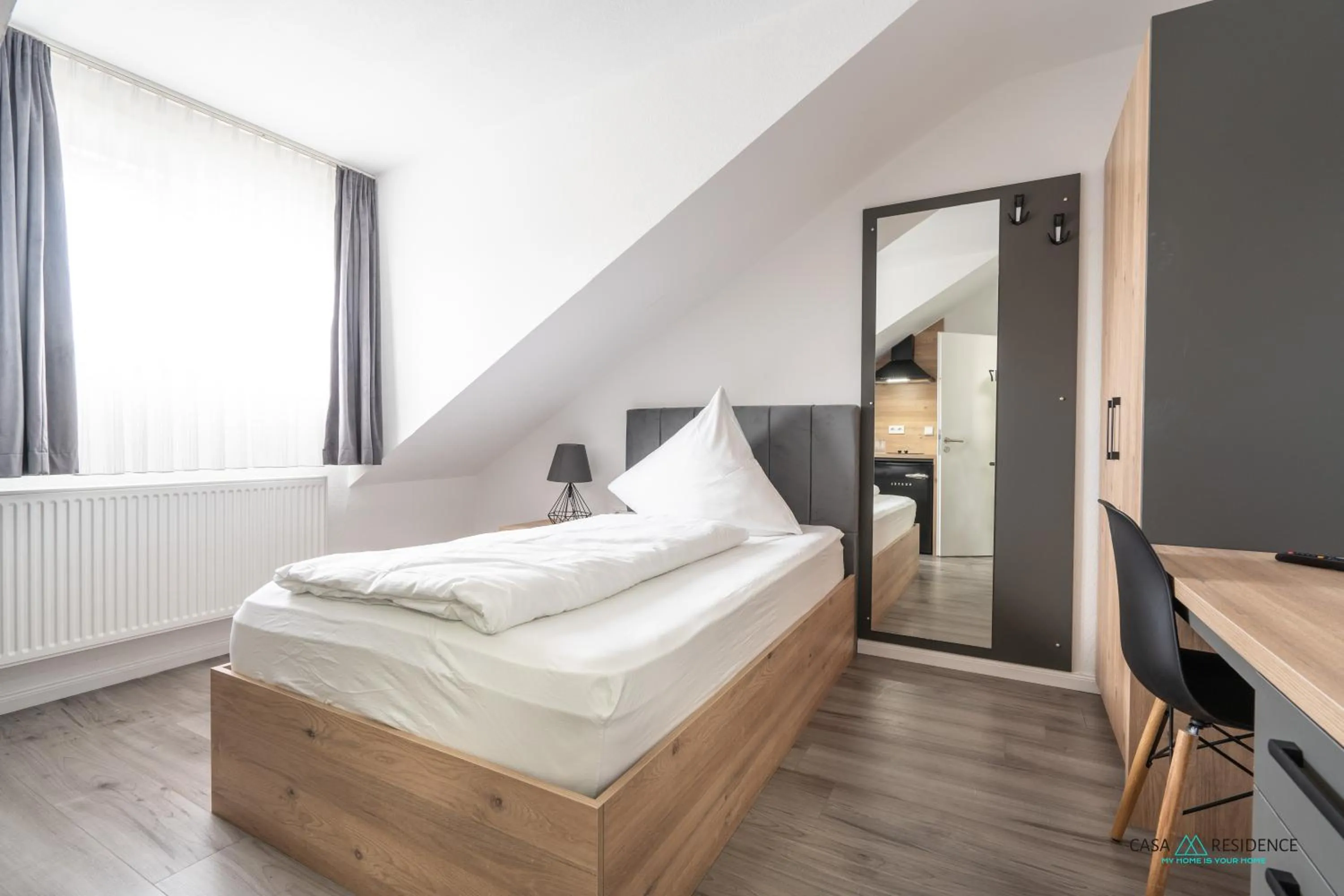 Bed in Louis Apartments