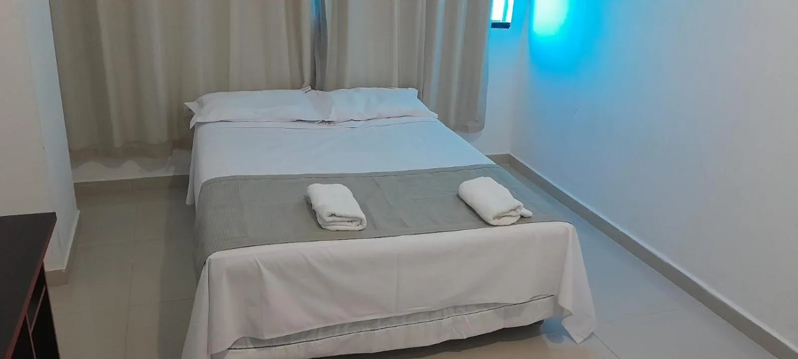 Bed in Central Palace Hotel