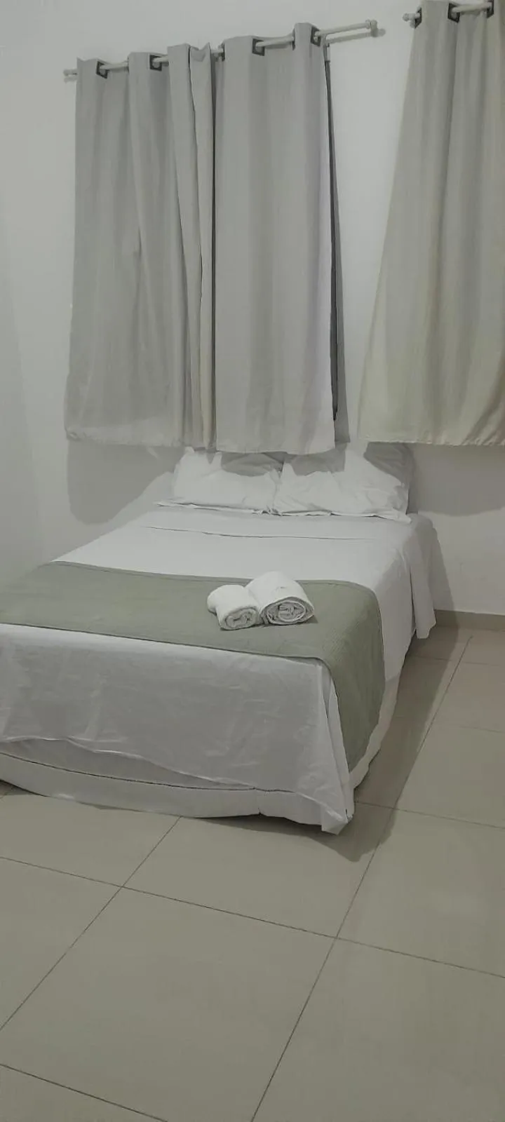 Bed in Central Palace Hotel