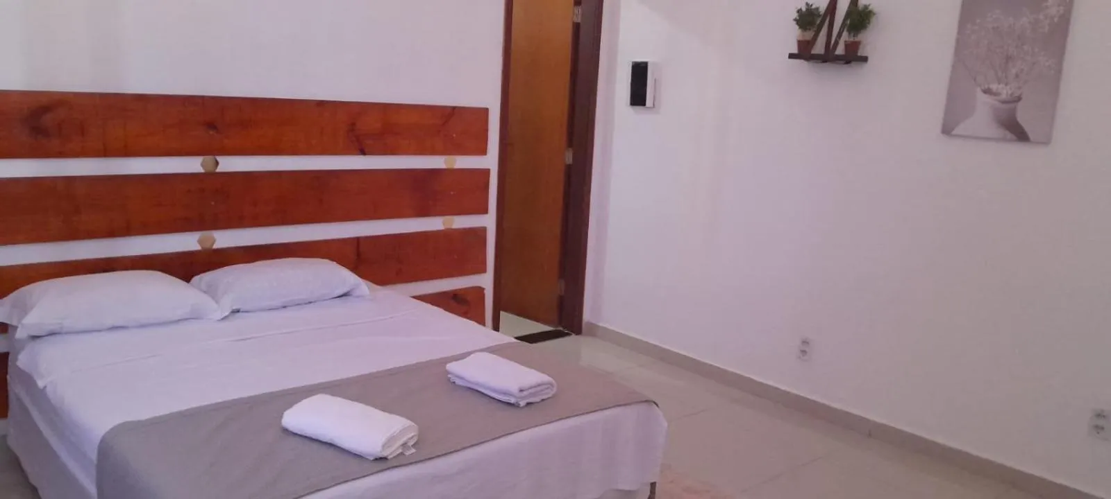 Bed in Central Palace Hotel