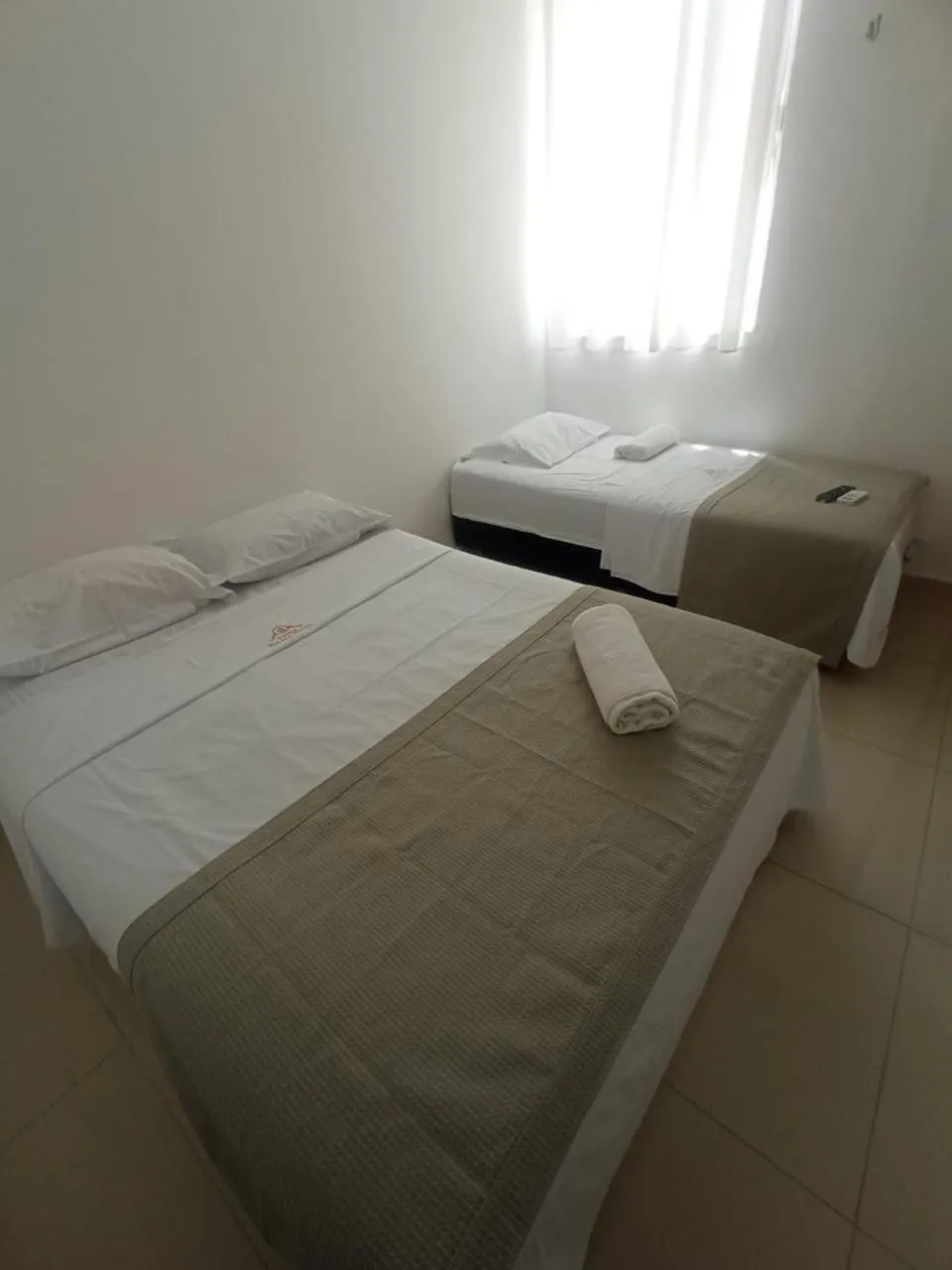 Bed in Central Palace Hotel