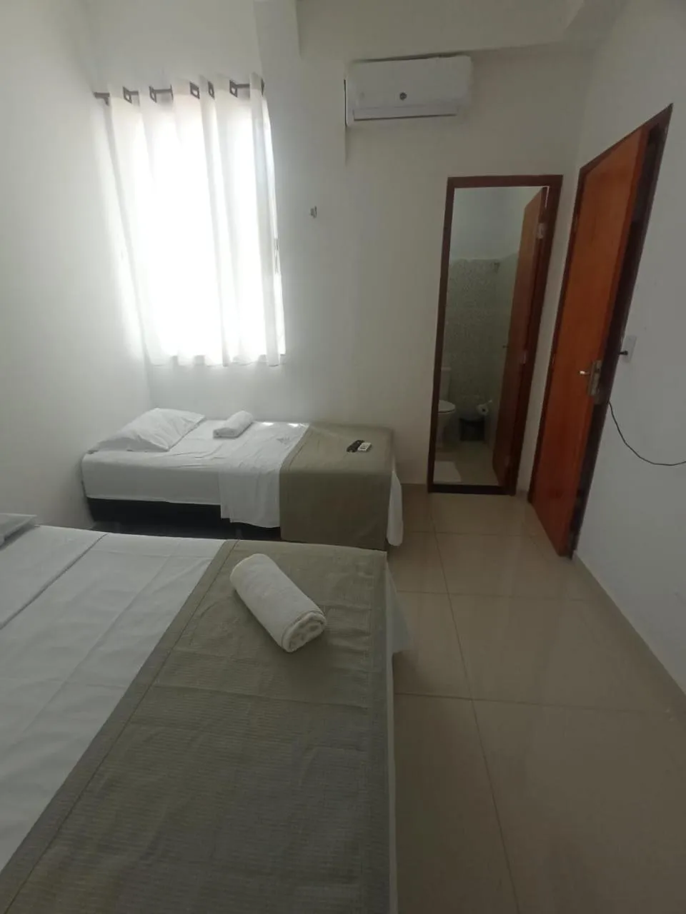 Bed in Central Palace Hotel