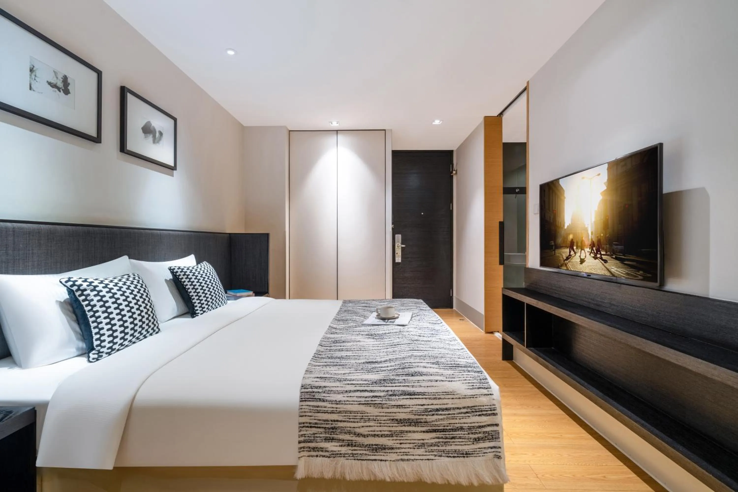 Communal lounge/ TV room, Bed in Citadines South Chengdu