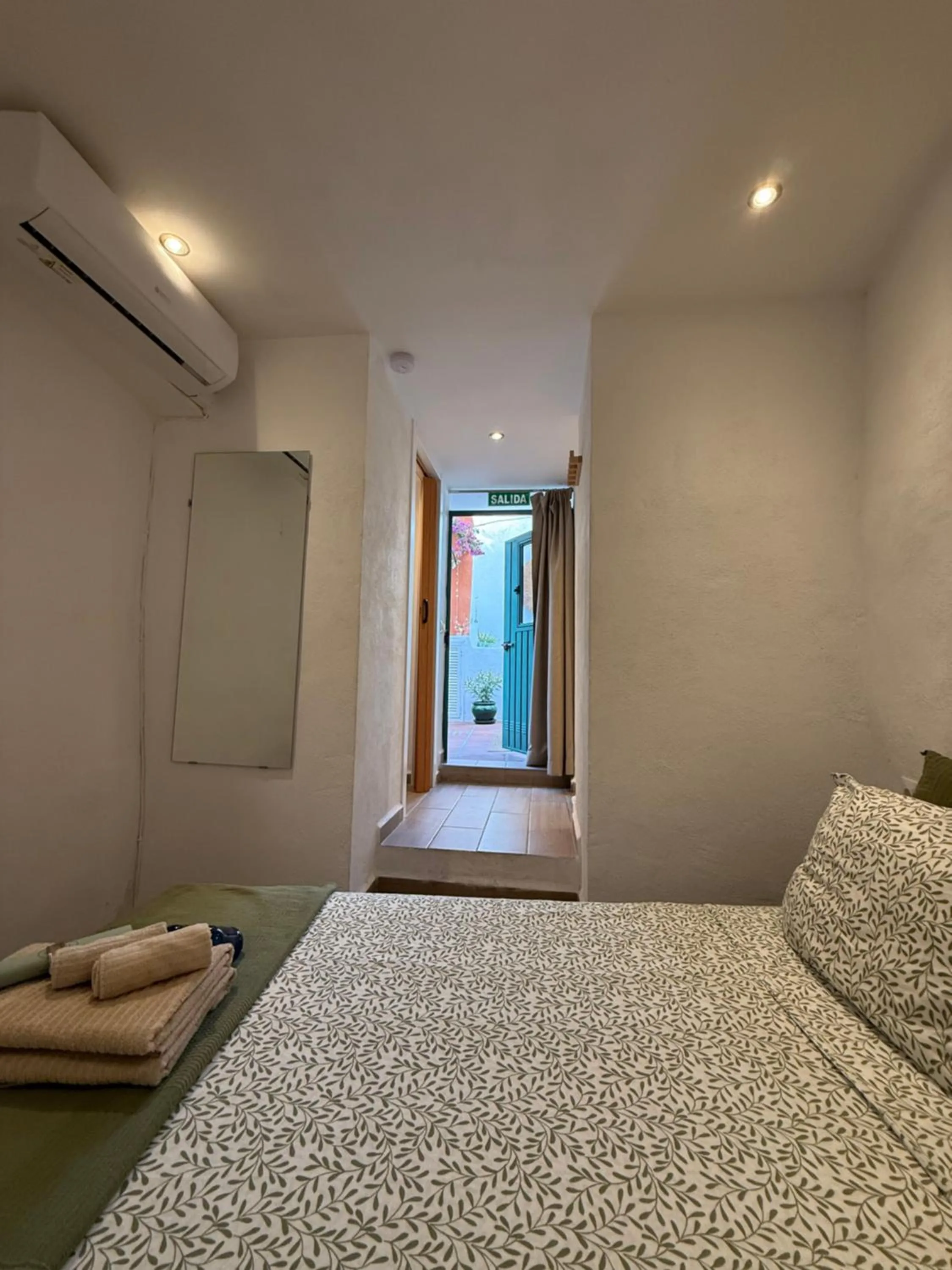 Bed in Encanto Guesthouse