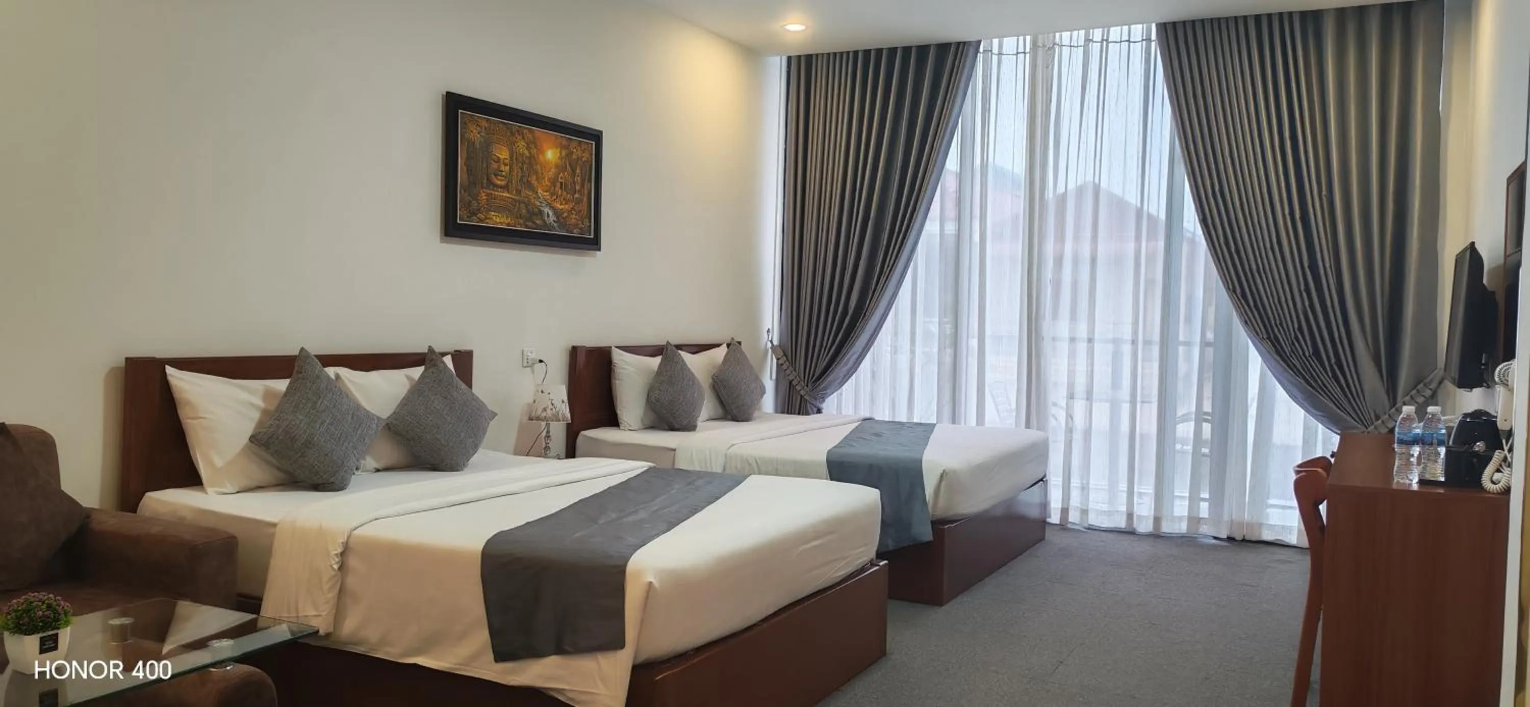 Photo of the whole room, Bed in Nimith Hotel & Restaurant