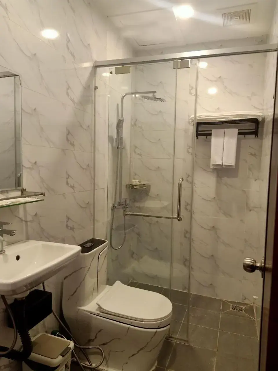 Bathroom in Nimith Hotel & Restaurant Bathroom in Nimith Hotel & Restaurant