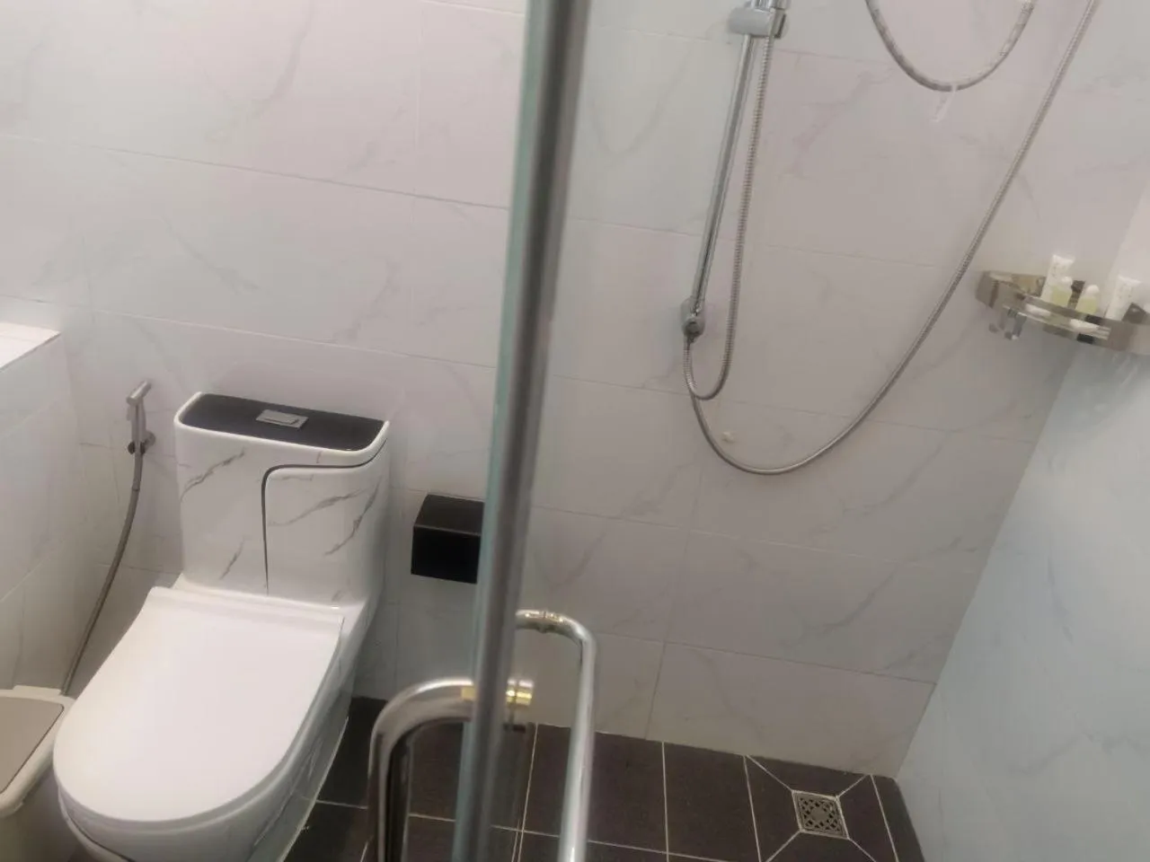 Bathroom in Nimith Hotel & Restaurant