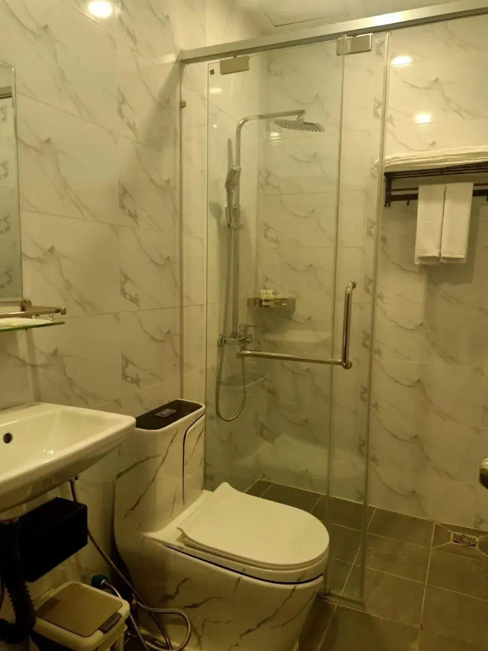 Bathroom in Nimith Hotel & Restaurant Bathroom in Nimith Hotel & Restaurant