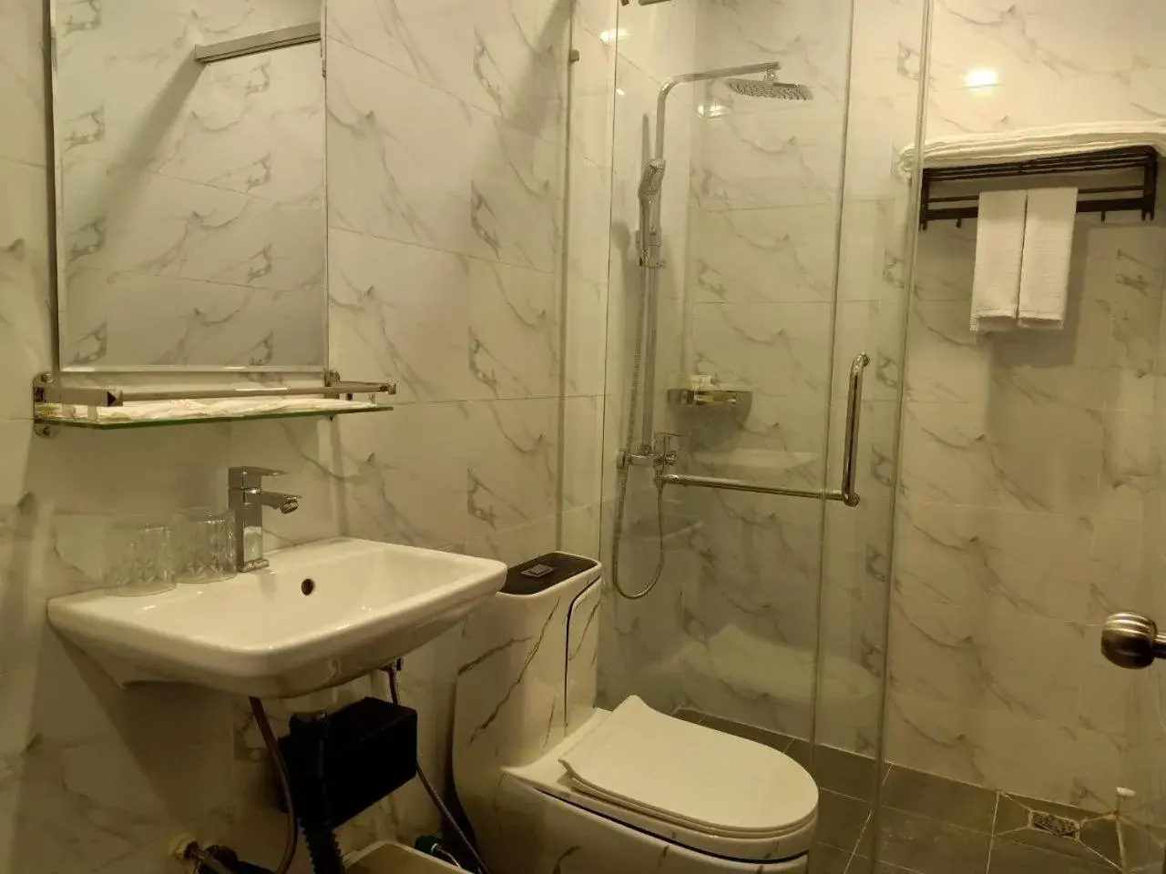 Bathroom in Nimith Hotel & Restaurant Bathroom in Nimith Hotel & Restaurant