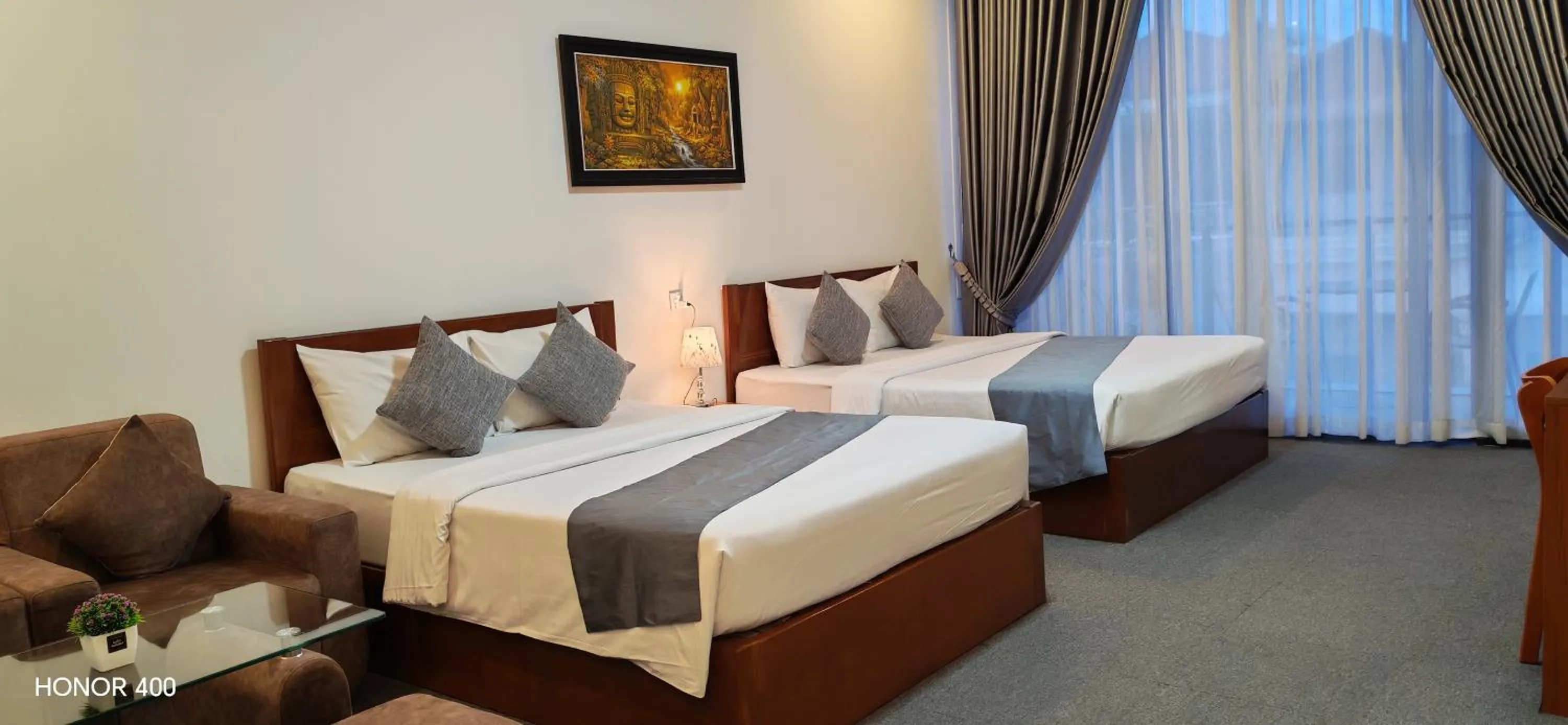 Photo of the whole room, Bed in Nimith Hotel & Restaurant