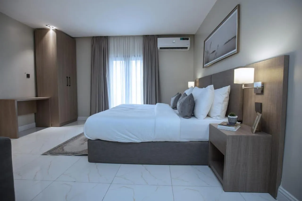 Bed in Knightsbridge Hotel & Suites