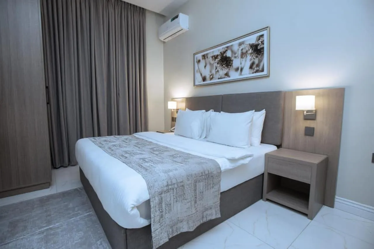 Bed in Knightsbridge Hotel & Suites