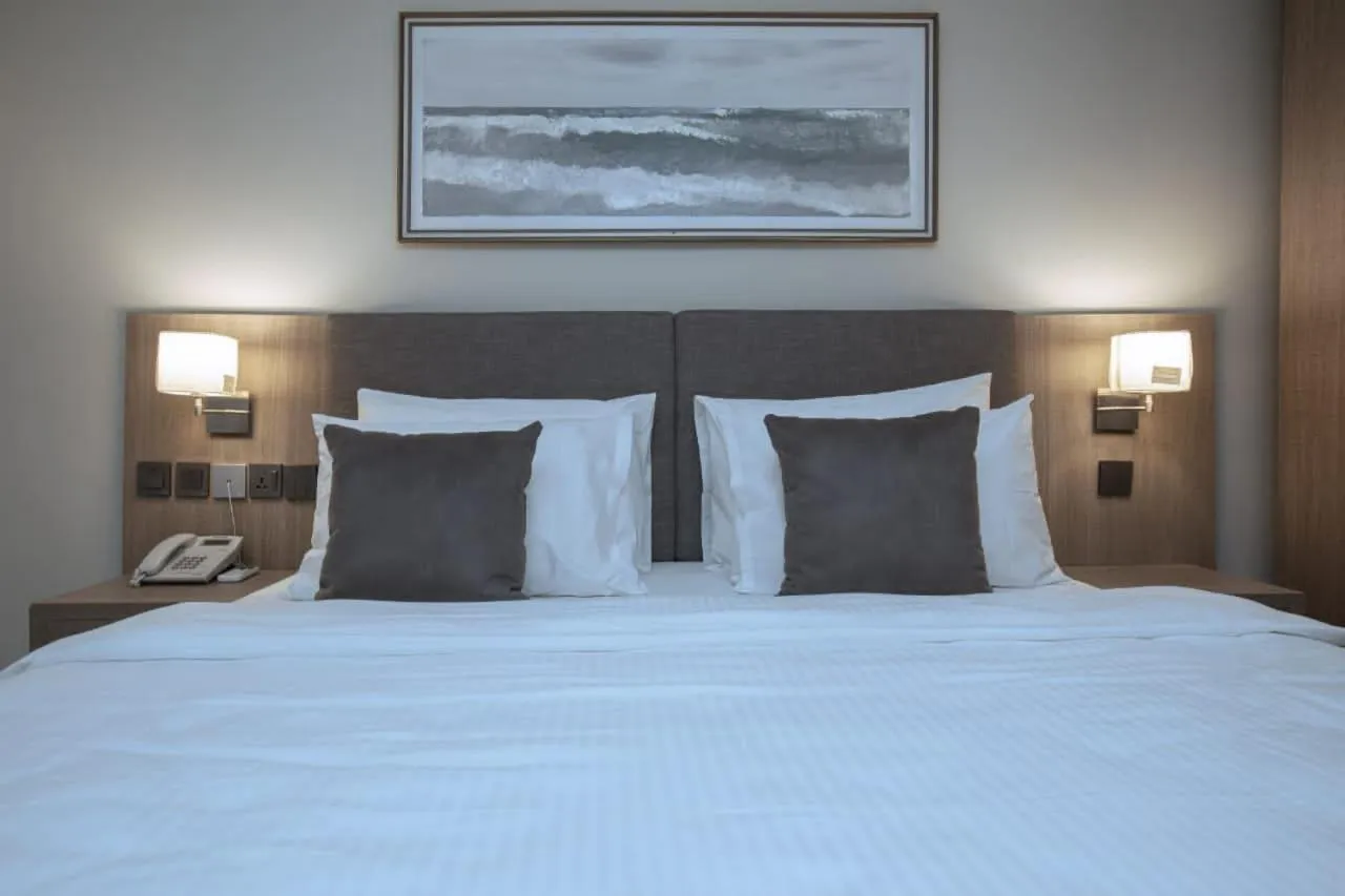 Bed in Knightsbridge Hotel & Suites