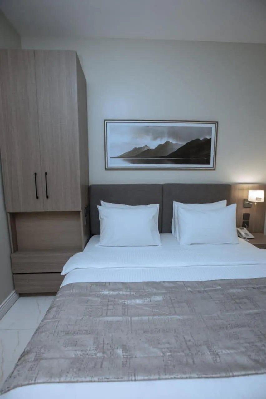 Bed in Knightsbridge Hotel & Suites