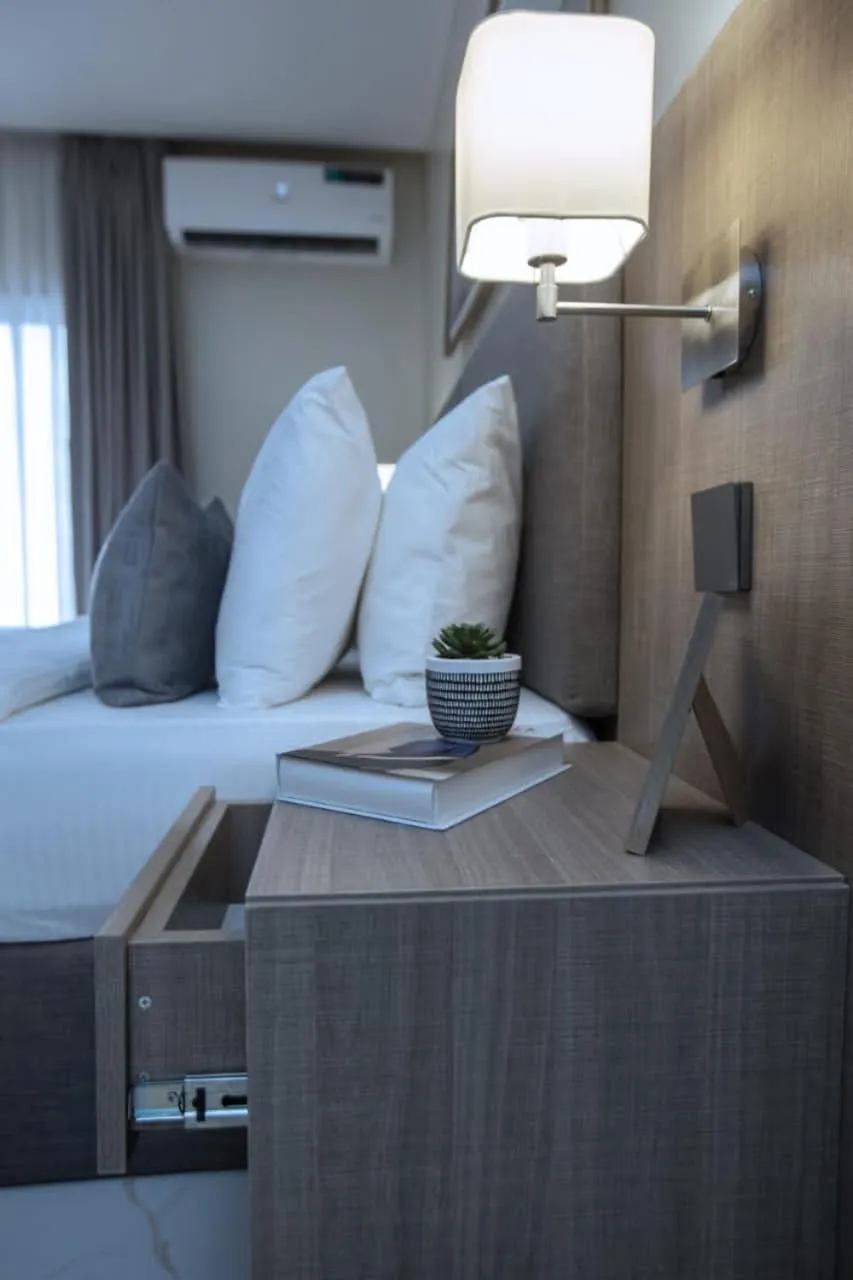 Bed in Knightsbridge Hotel & Suites