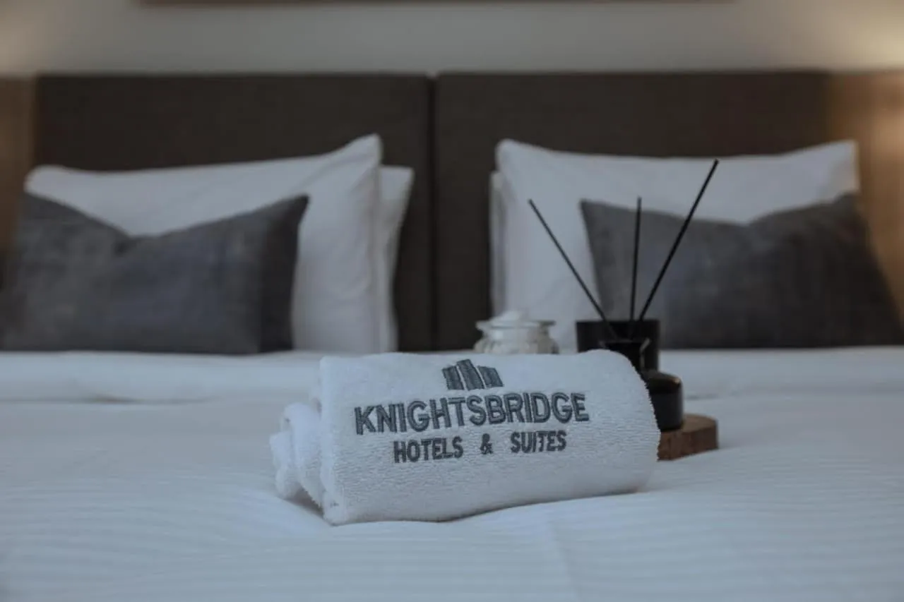 Bed in Knightsbridge Hotel & Suites
