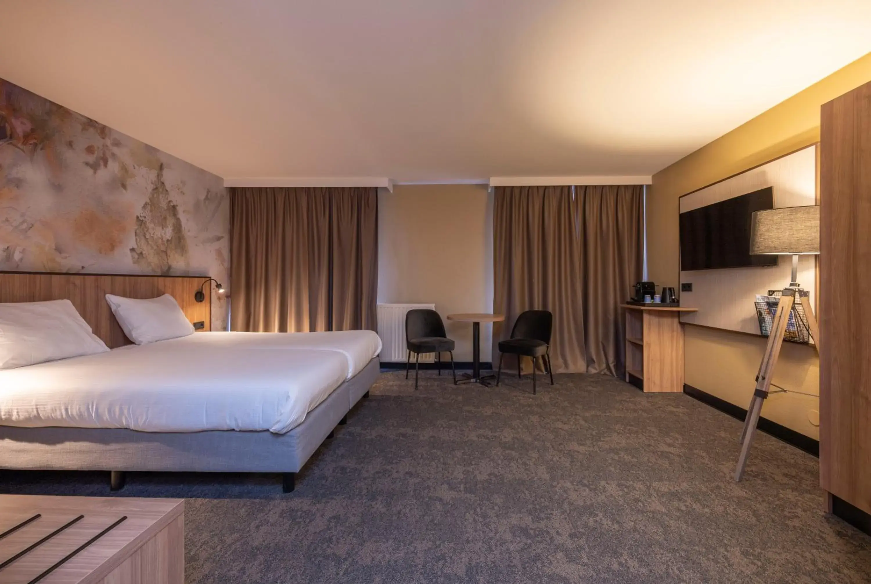 Bed in Fletcher Hotel-Restaurant Klein Zwitserland Bed in Fletcher Hotel-Restaurant Klein Zwitserland