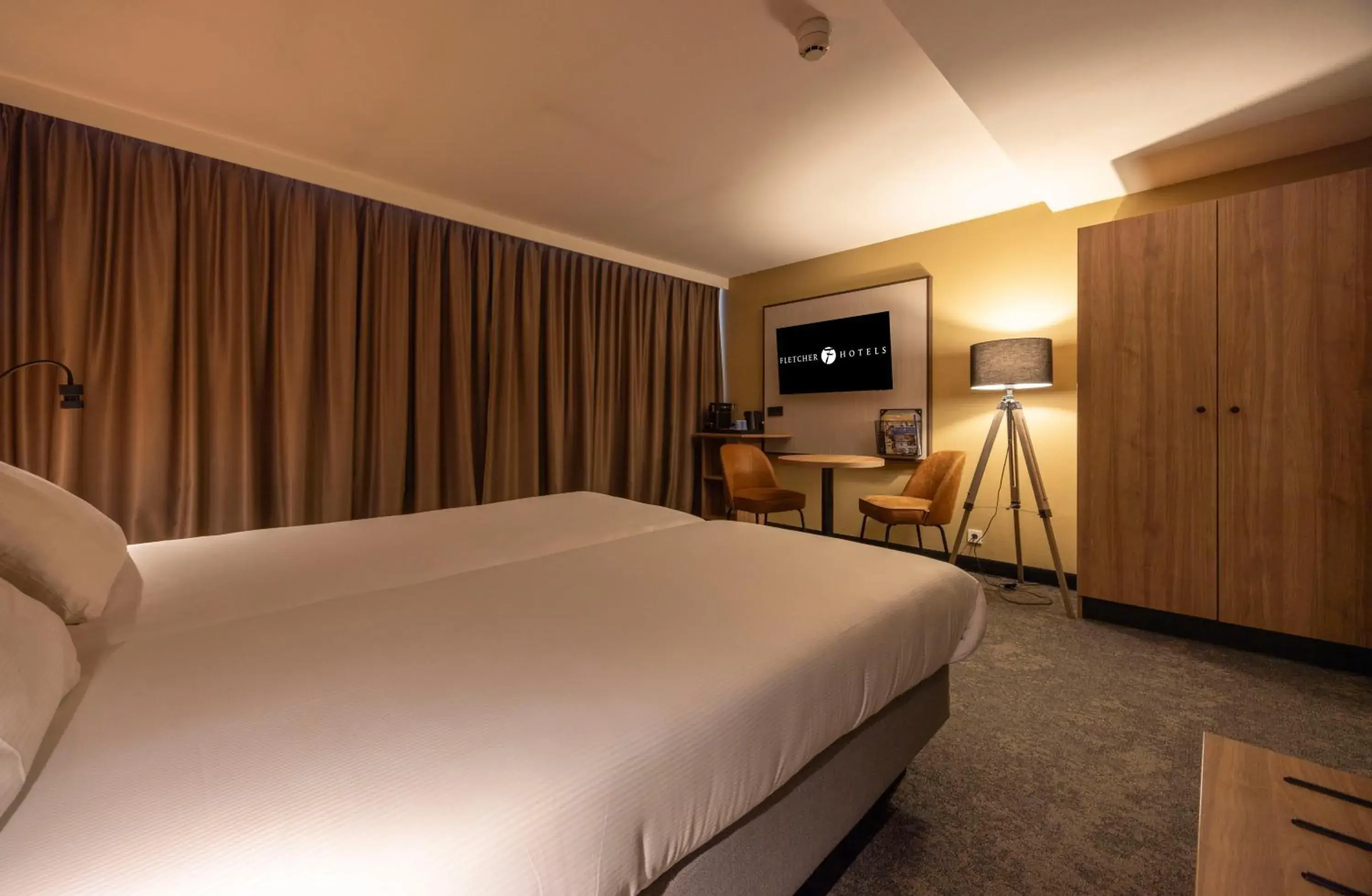 Photo of the whole room, Bed in Fletcher Hotel-Restaurant Klein Zwitserland Photo of the whole room, Bed in Fletcher Hotel-Restaurant Klein Zwitserland