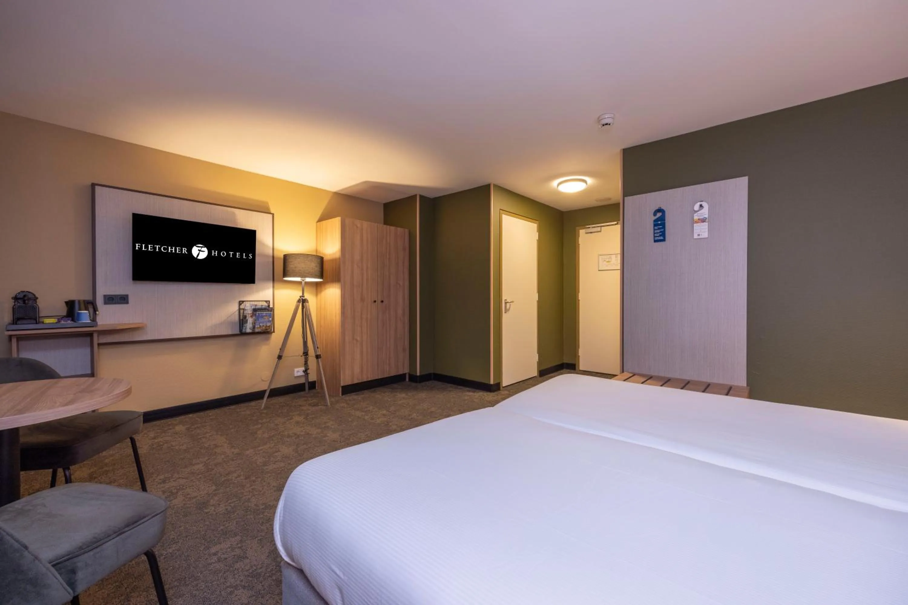 Bed in Fletcher Hotel-Restaurant Klein Zwitserland