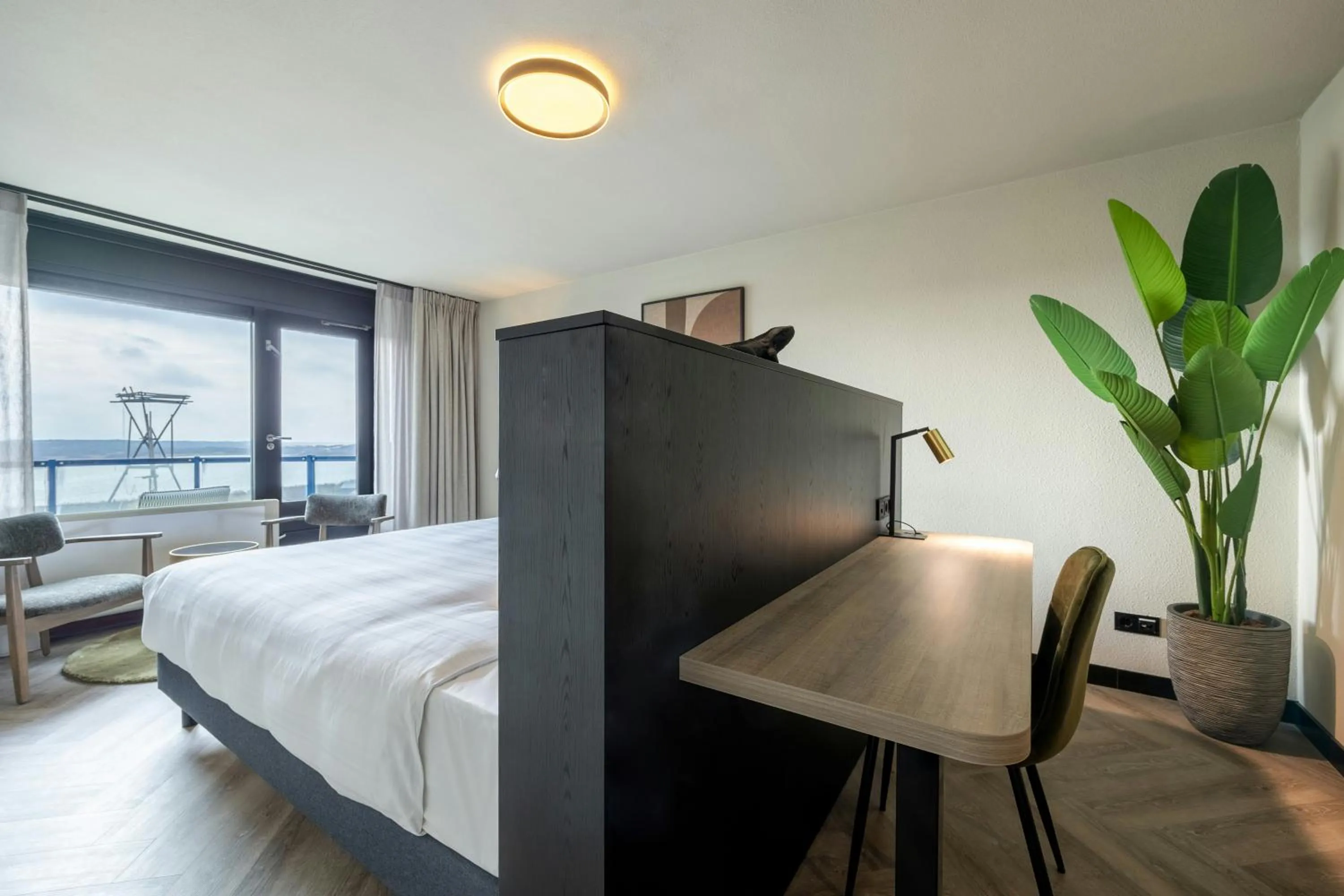 Photo of the whole room, Bed in Leonardo Hotel IJmuiden Seaport Beach