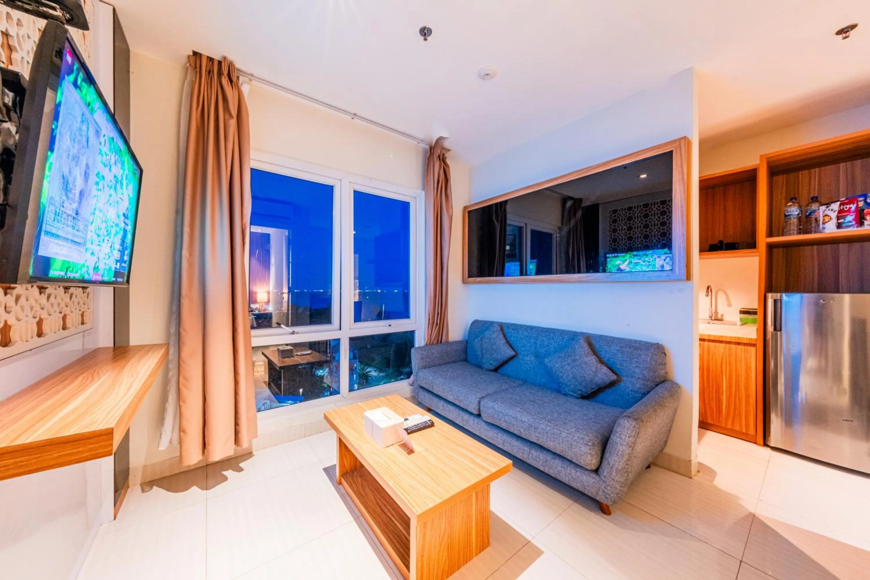 Communal lounge/ TV room in Astara Hotel Balikpapan