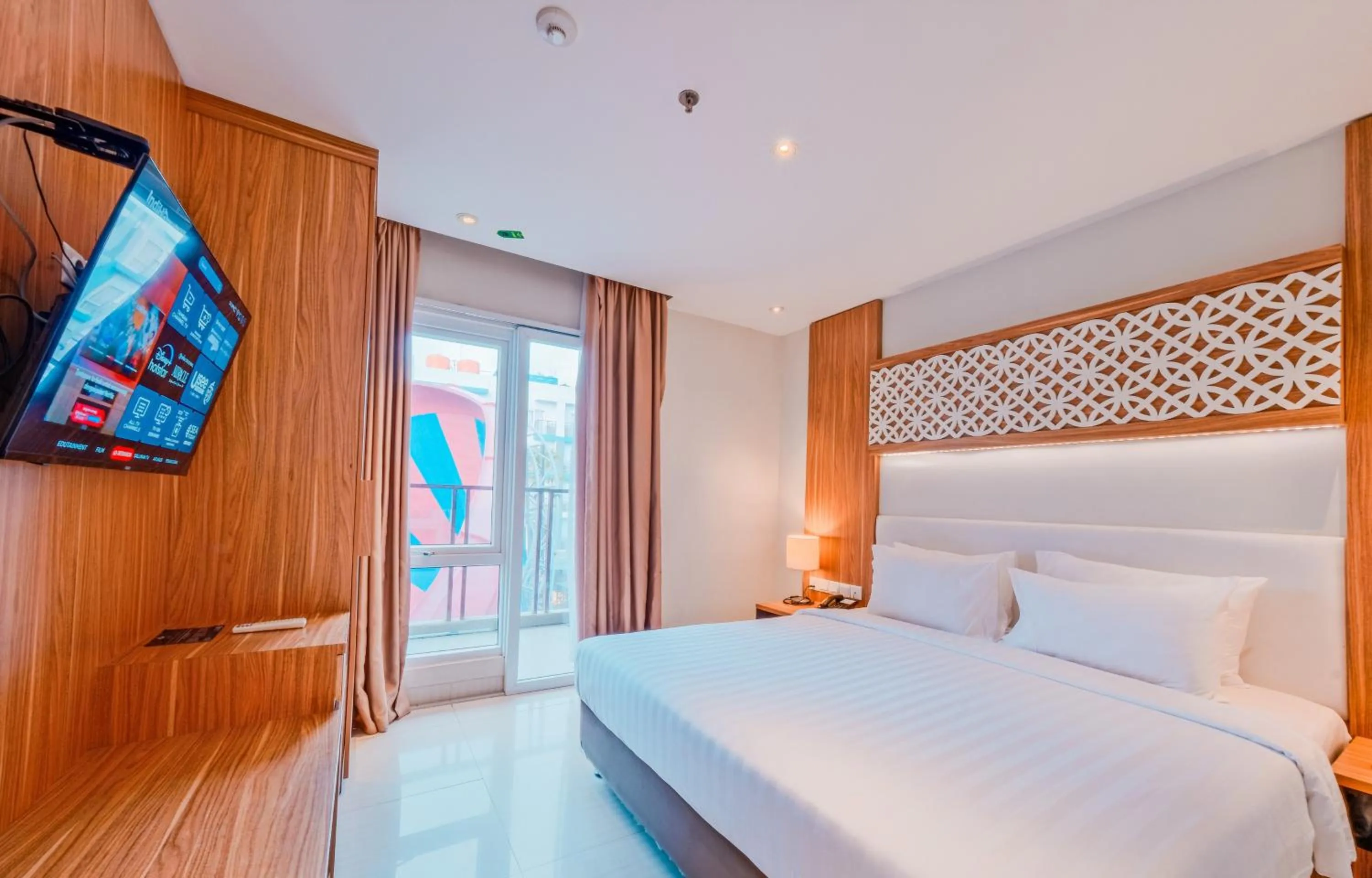 TV and multimedia, Bed in Astara Hotel Balikpapan