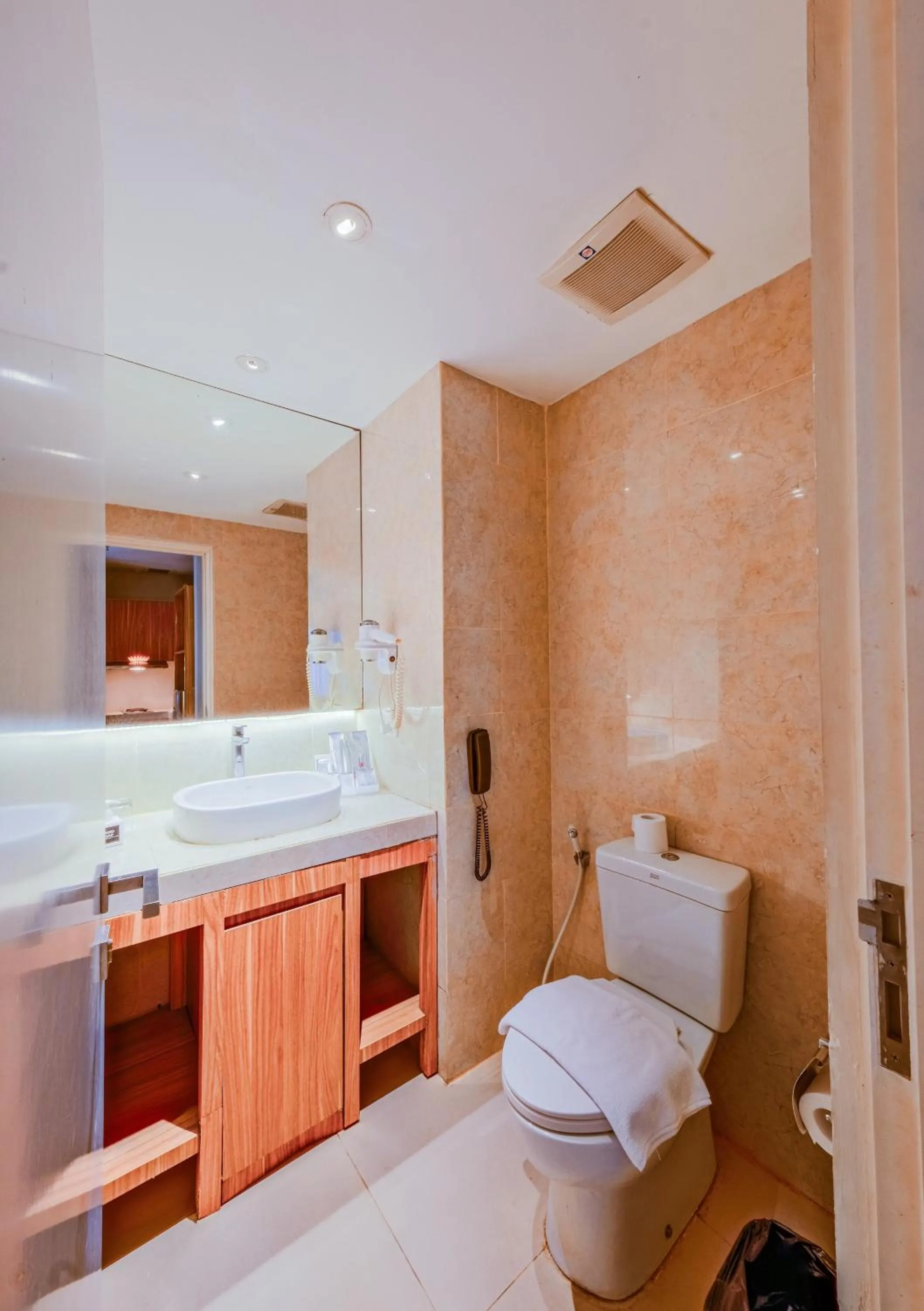 Bathroom, Bed in Astara Hotel Balikpapan