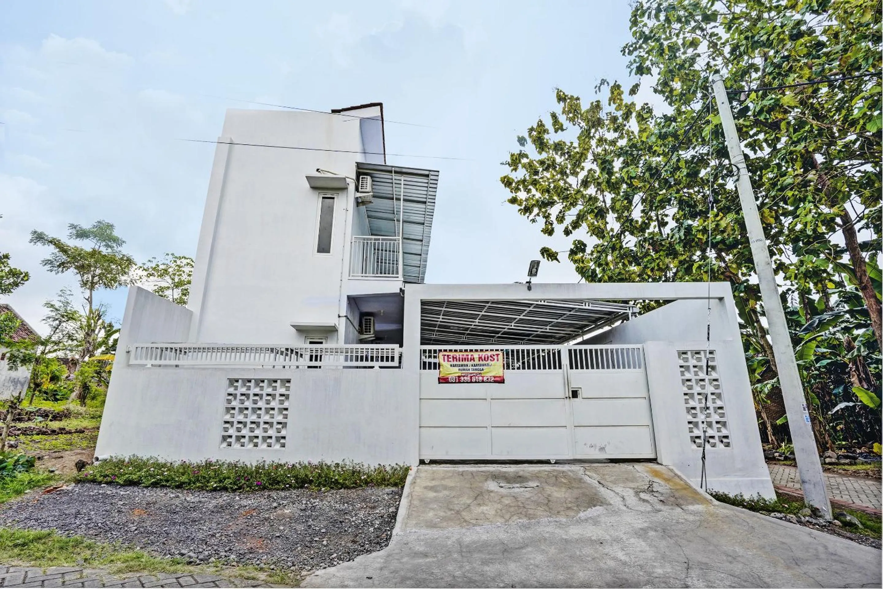 Facade/entrance in Hotel O Niza Guesthouse Syariah
