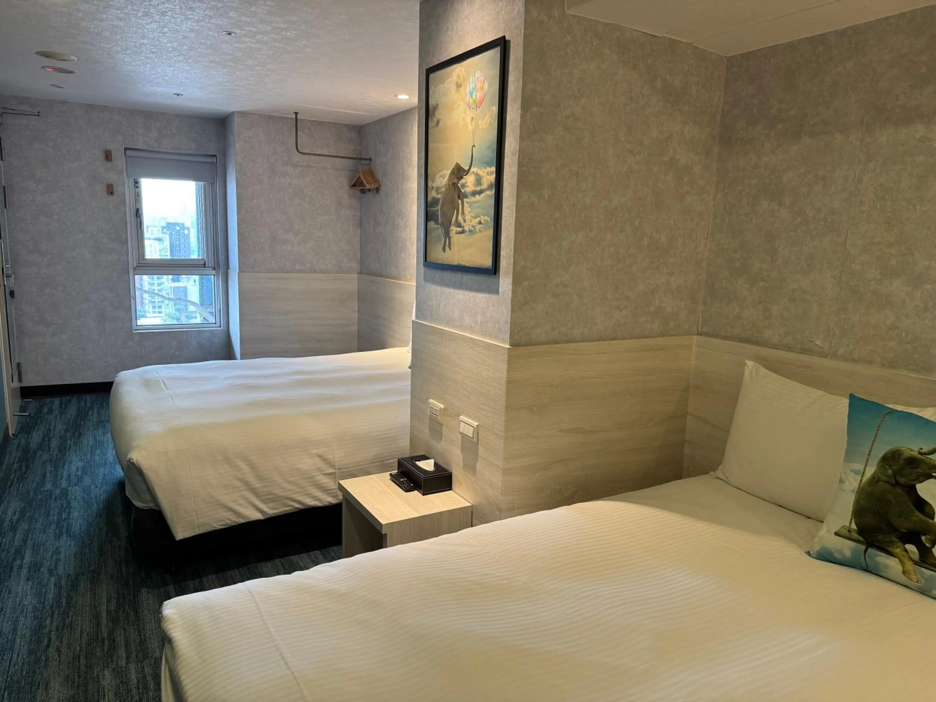 Bed in 西門雲町旅店 Sky Gate Hotel