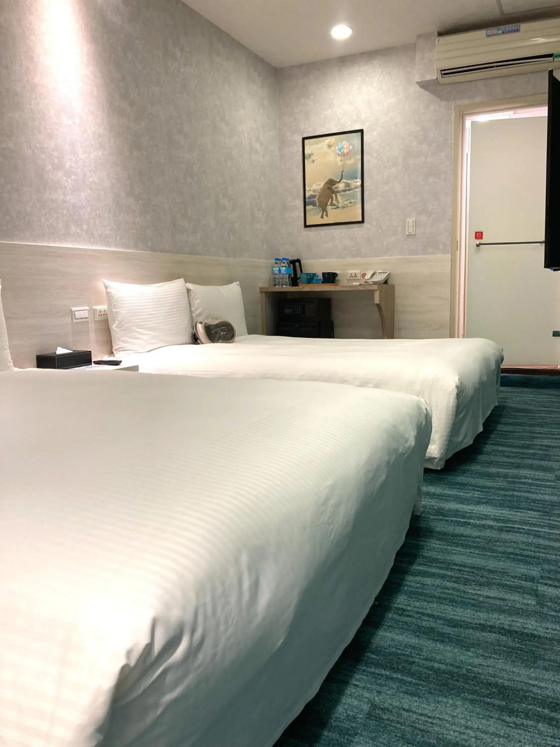 Bed in 西門雲町旅店 Sky Gate Hotel Bed in 西門雲町旅店 Sky Gate Hotel