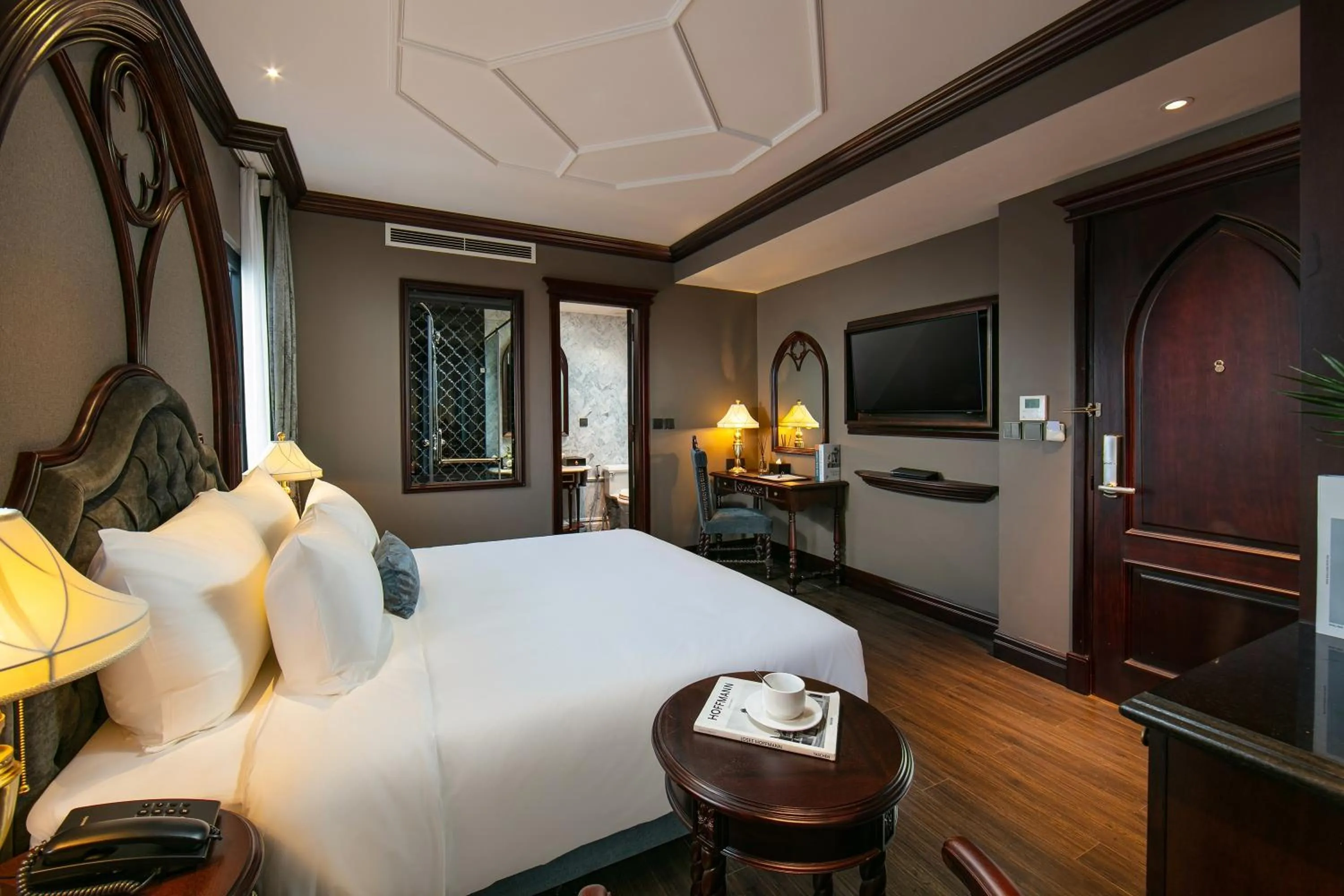Photo of the whole room, Bed in Le Chanvre Hanoi Hotel & Spa