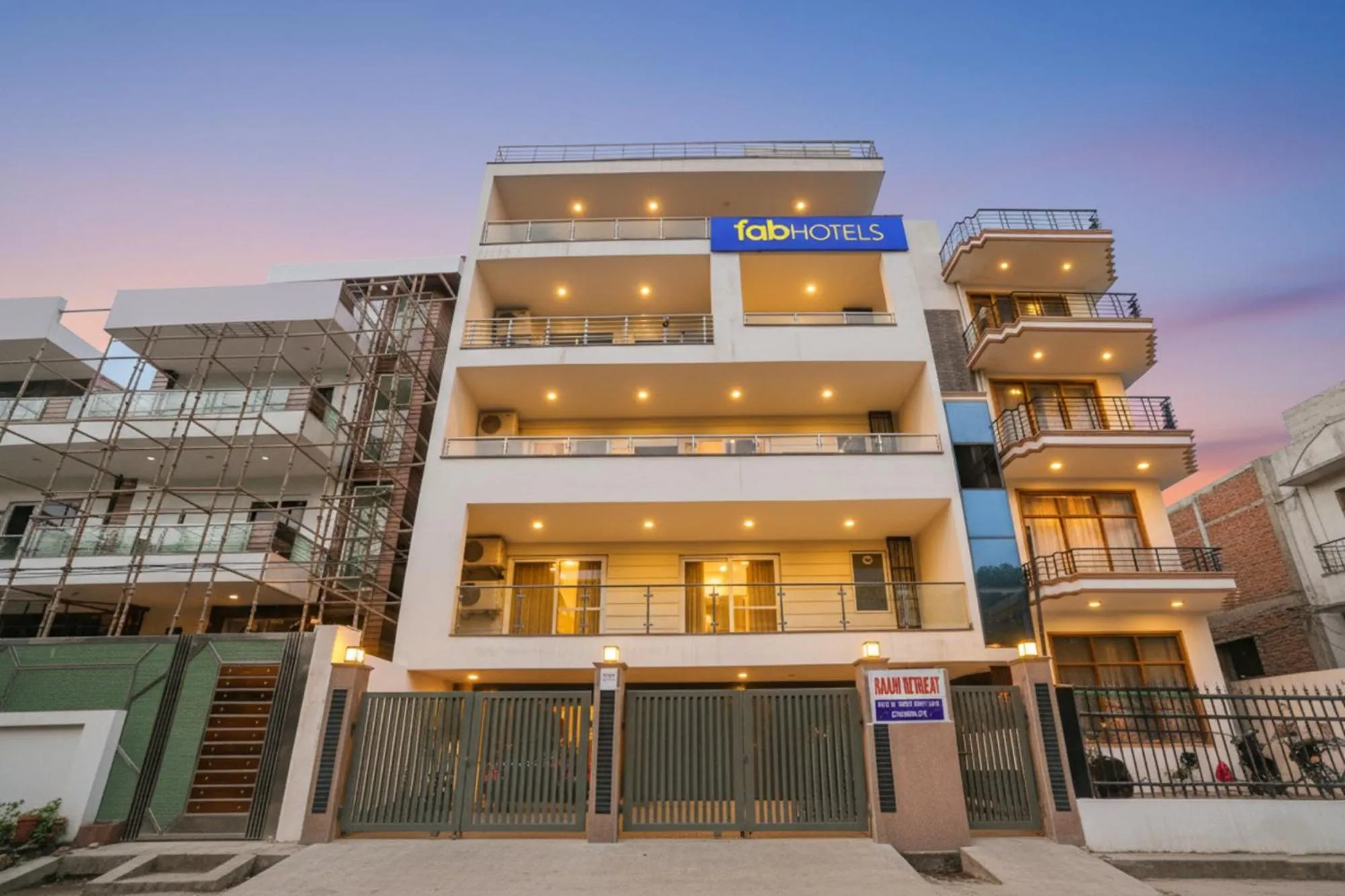 Property building in FabHotel Raahi Retreat - Nr Star Mall & 32nd Avenue