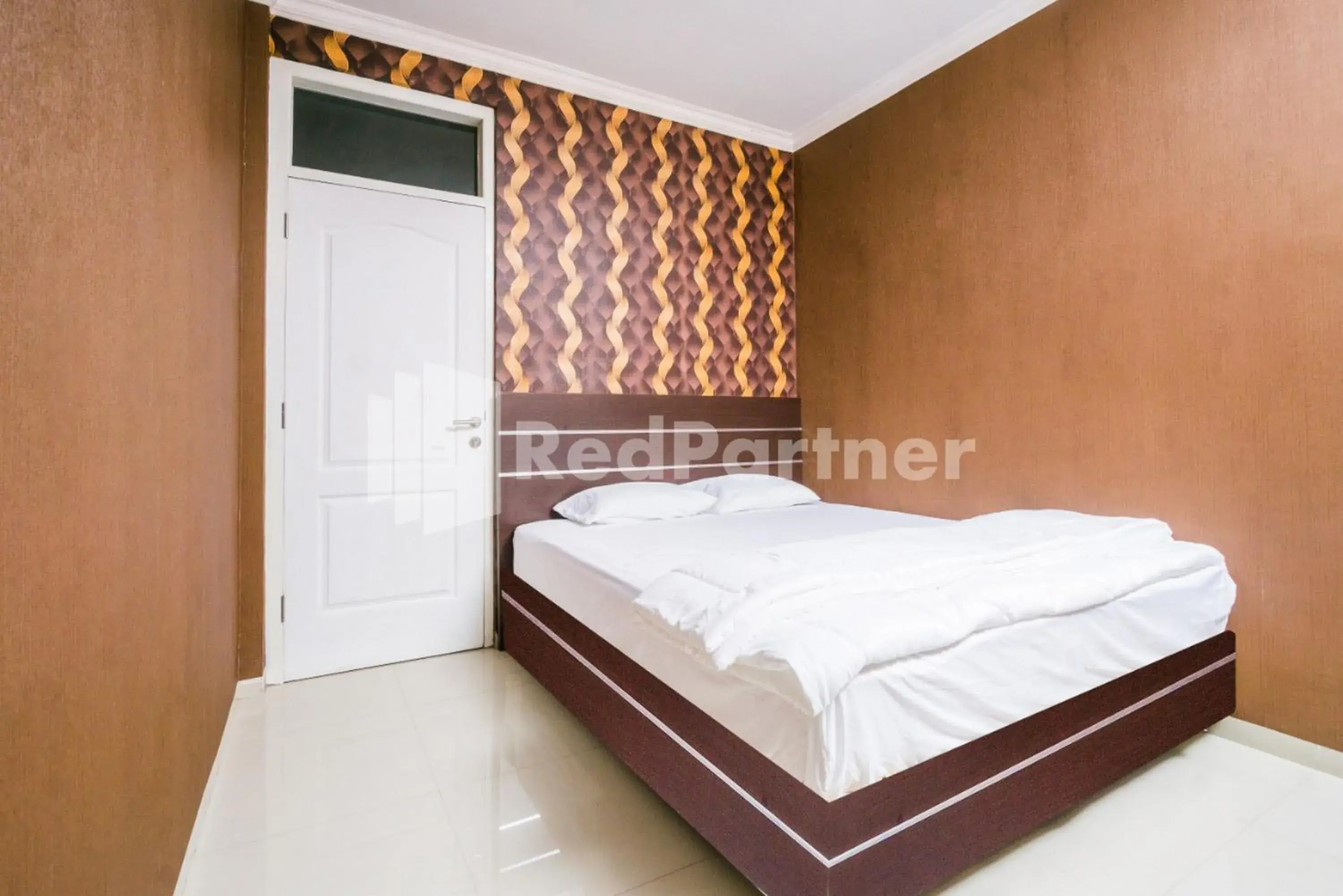 Bed in Omah Kalimosodo Mitra RedDoorz near Stasiun Malang Kota Baru Bed in Omah Kalimosodo Mitra RedDoorz near Stasiun Malang Kota Baru