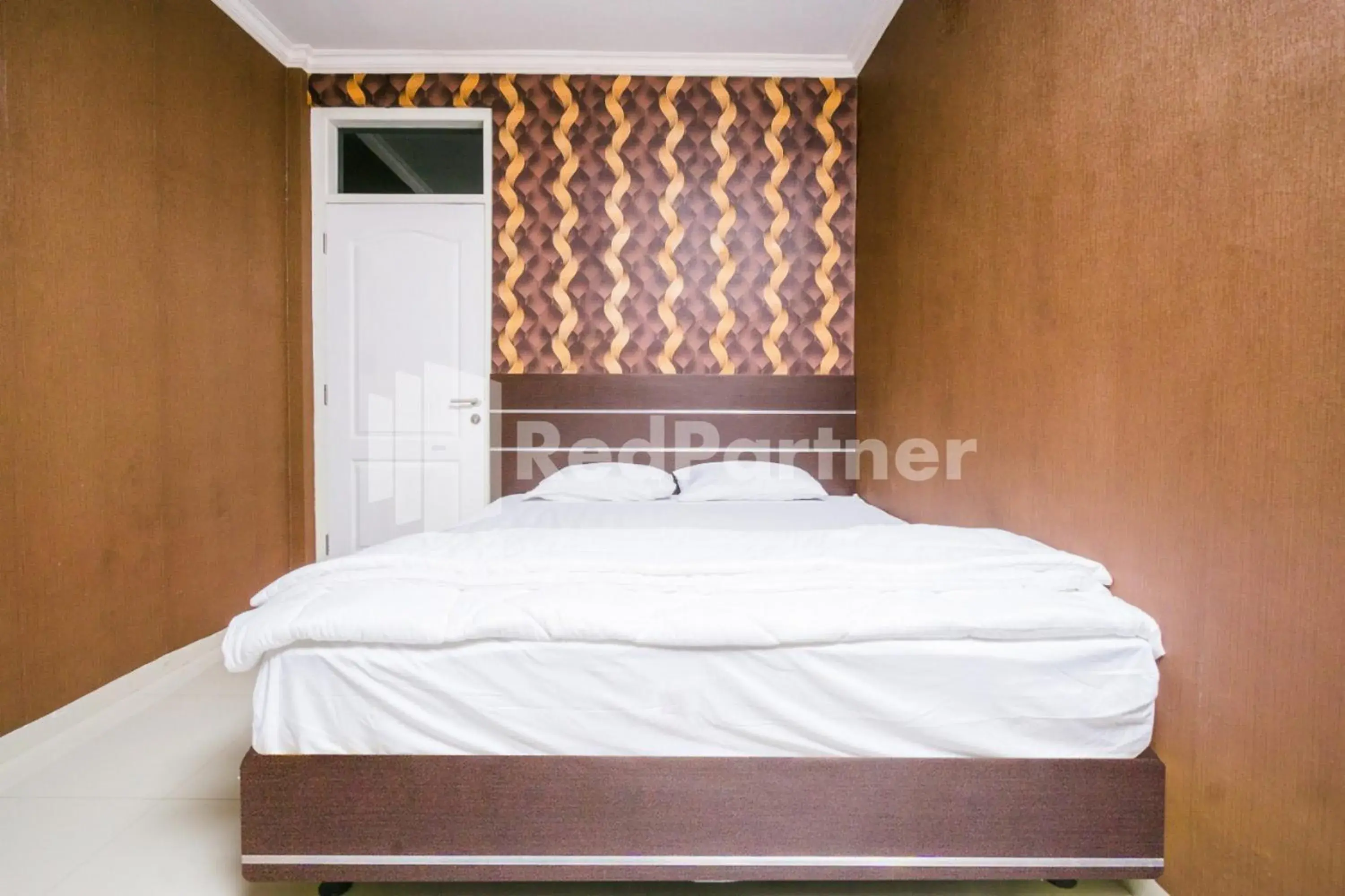 Bed in Omah Kalimosodo Mitra RedDoorz near Stasiun Malang Kota Baru Bed in Omah Kalimosodo Mitra RedDoorz near Stasiun Malang Kota Baru