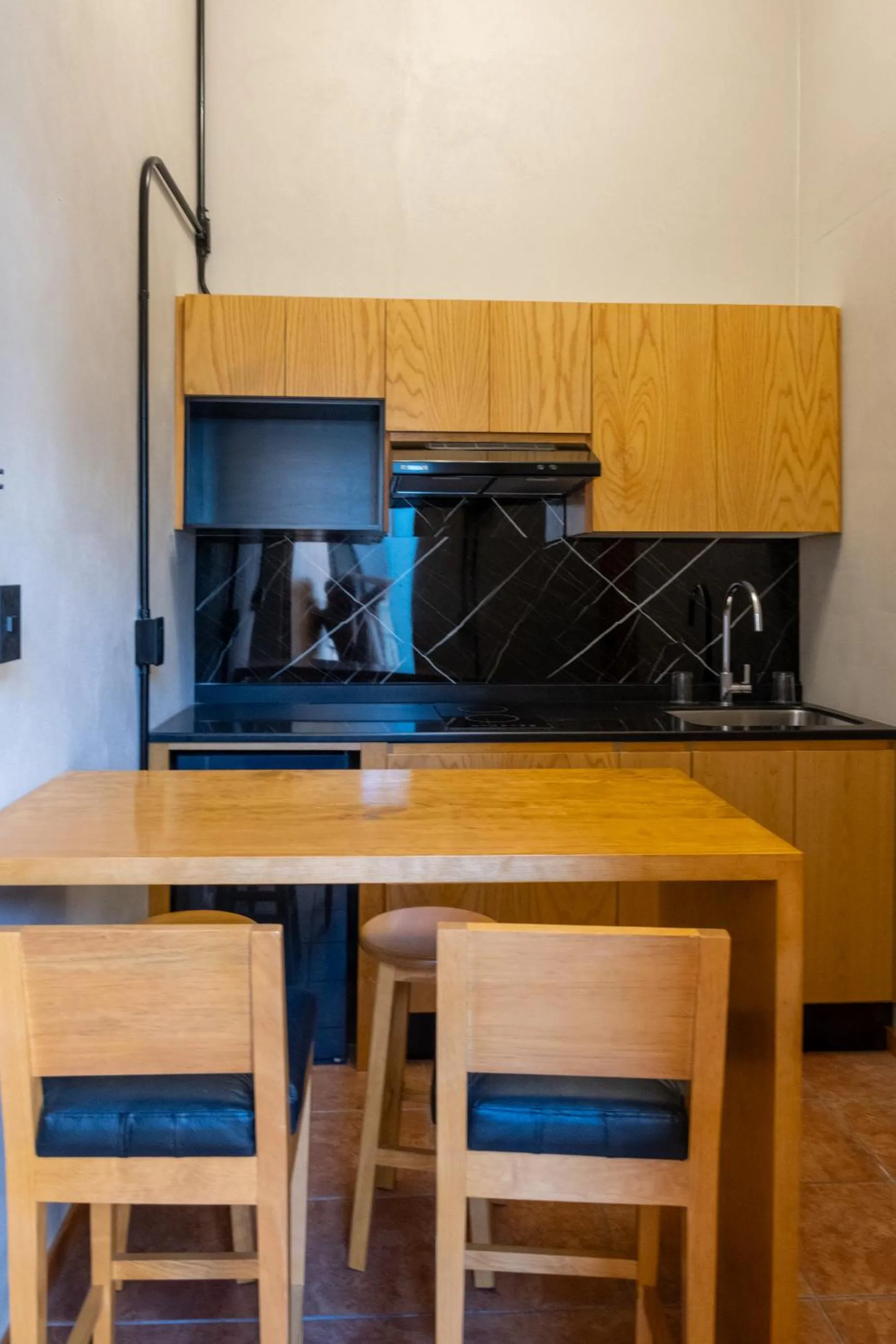 Kitchen or kitchenette in Suites Patio Antequera