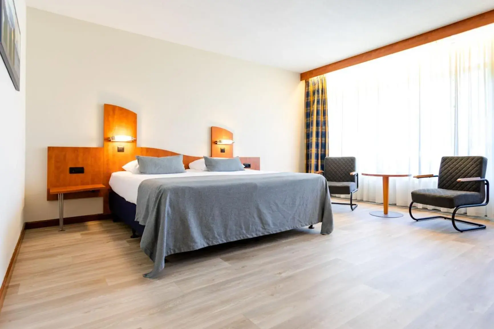 Photo of the whole room, Bed in Fletcher Hotel-Restaurant De Reiskoffer Photo of the whole room, Bed in Fletcher Hotel-Restaurant De Reiskoffer