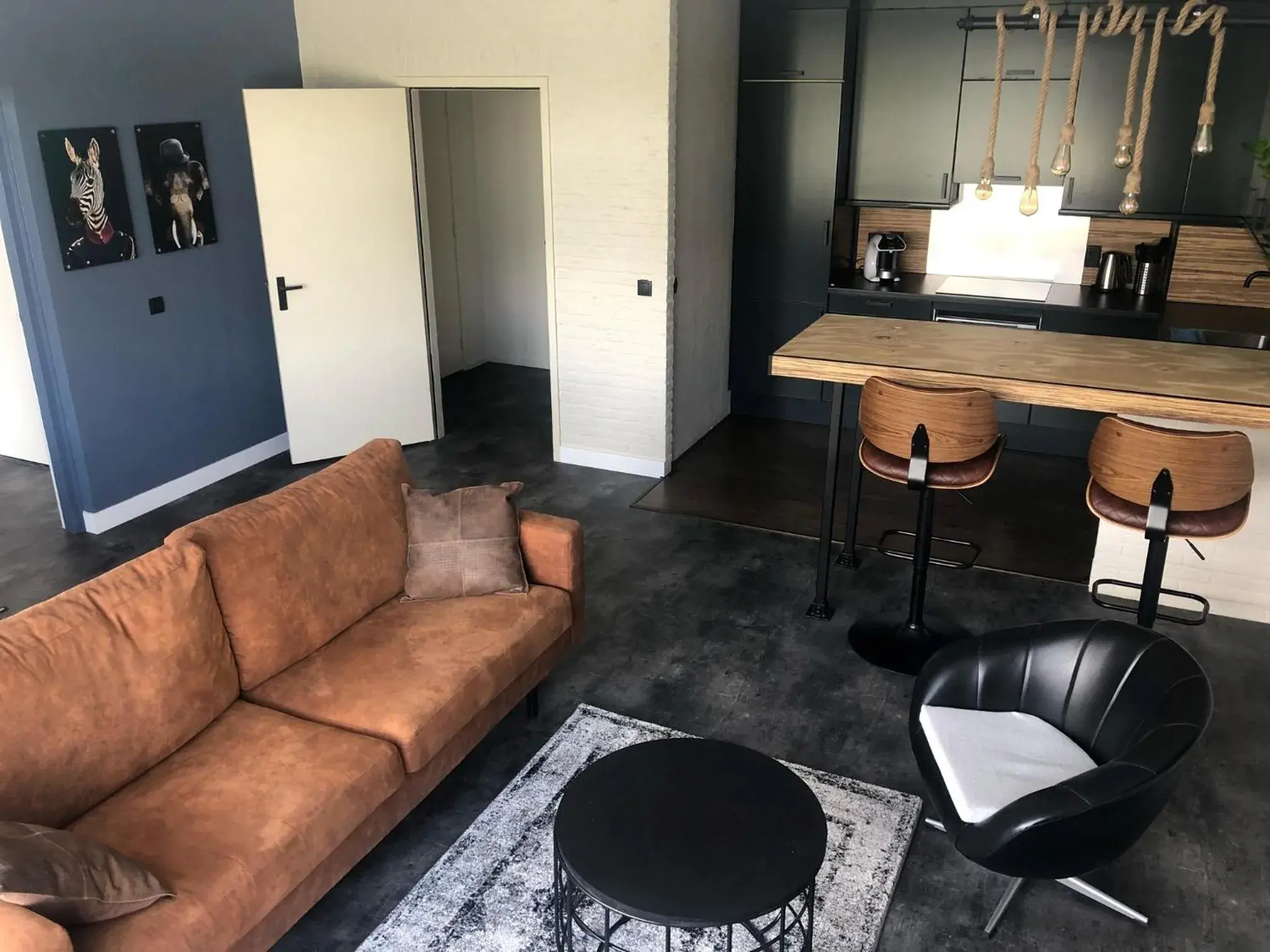 Living room in Fletcher Hotel-Restaurant De Reiskoffer Living room in Fletcher Hotel-Restaurant De Reiskoffer