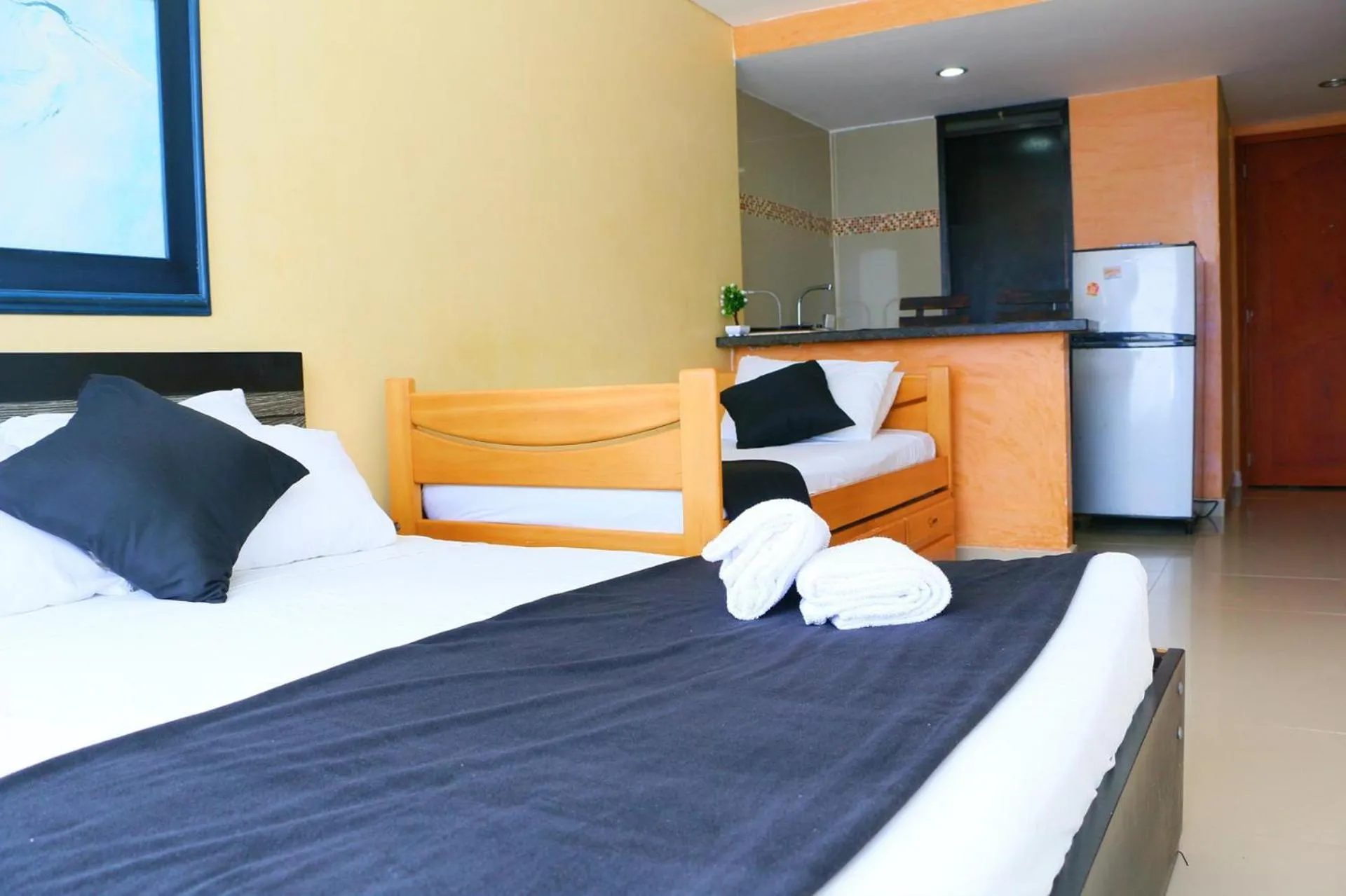 Bed in Studio Apartment E19C Close To The Sea And Pool