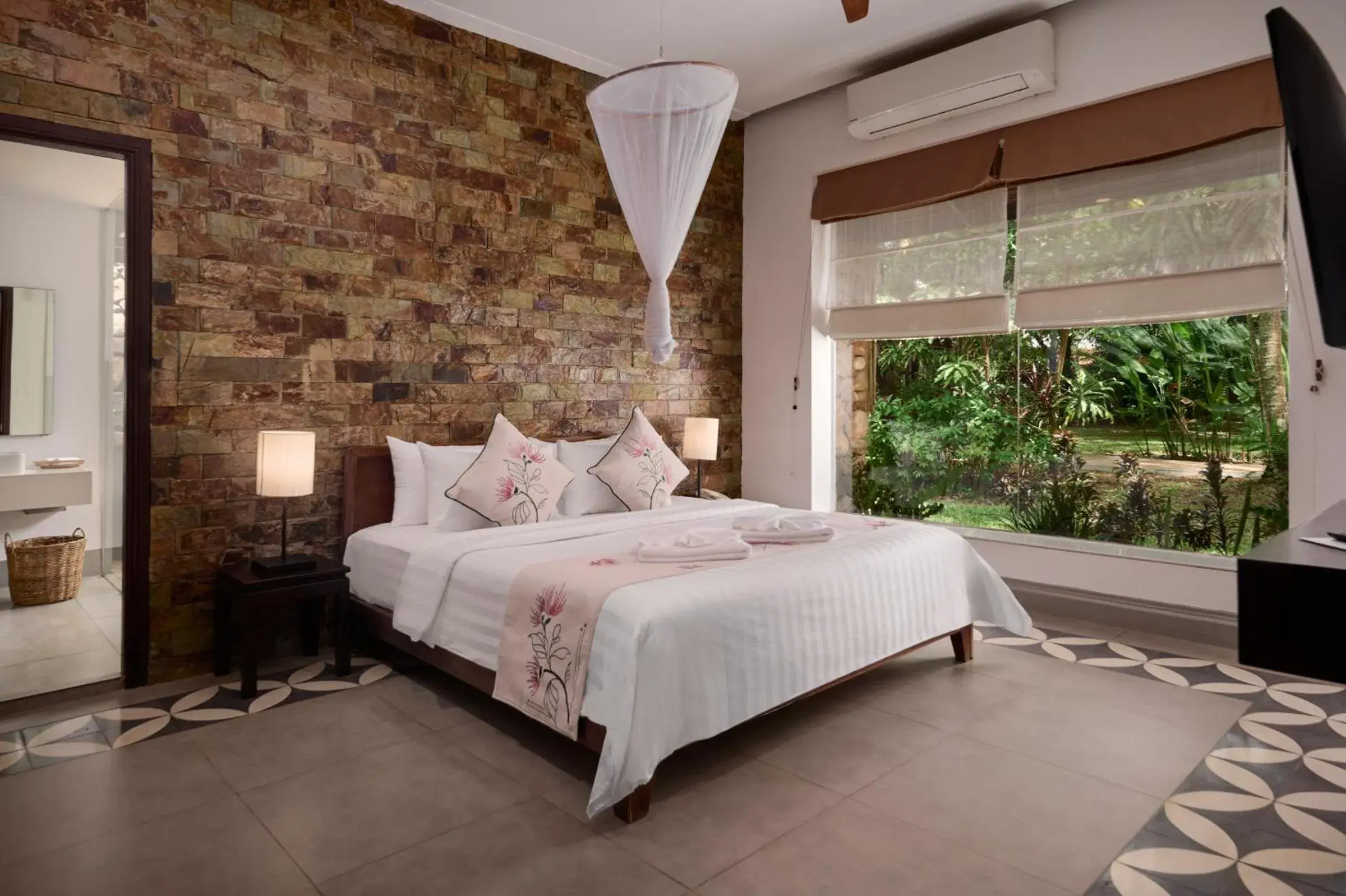 Bed in Samanea Beach Resort & Spa Bed in Samanea Beach Resort & Spa