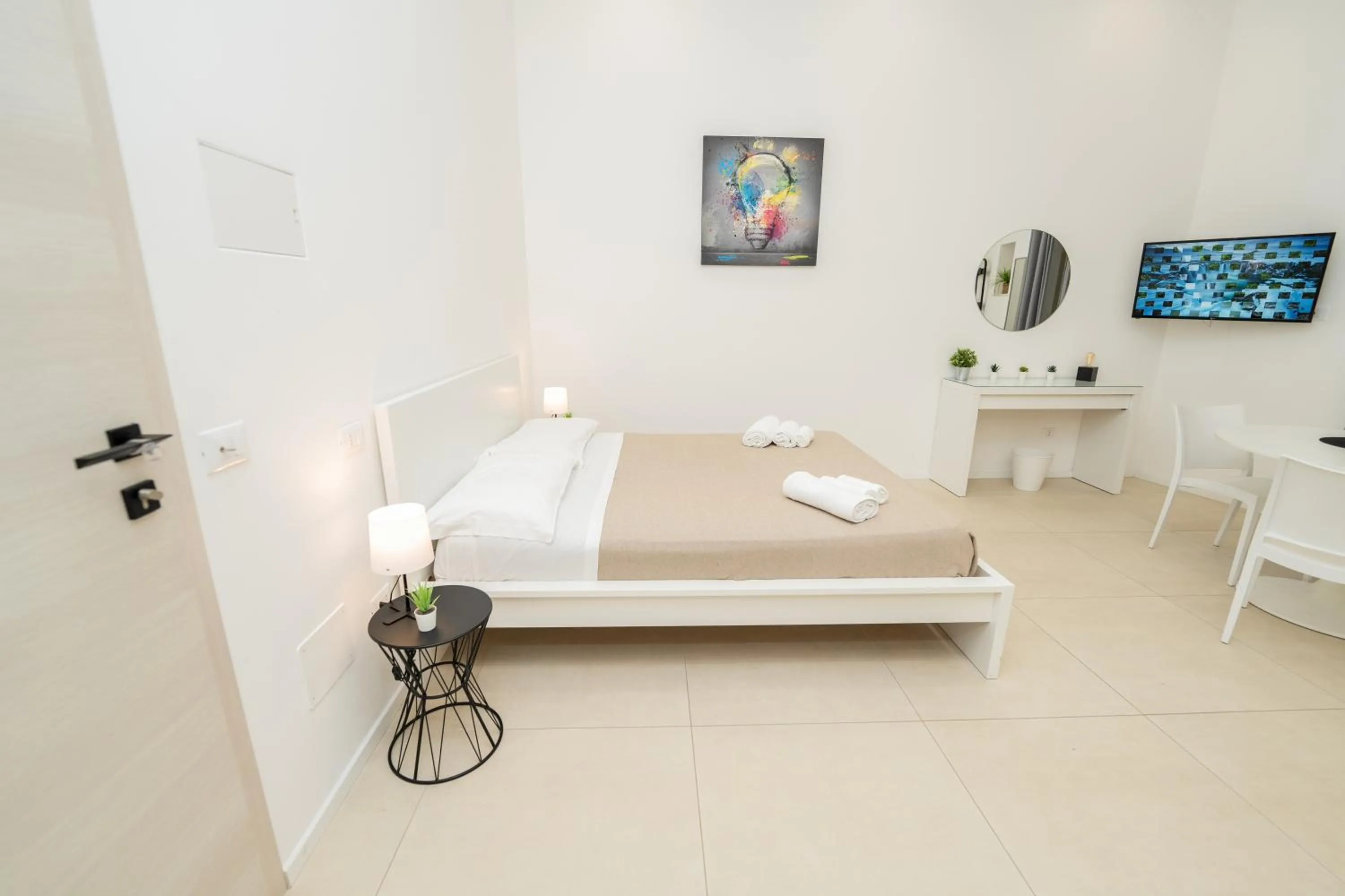 Bed in Valguarnera Studio Apartments