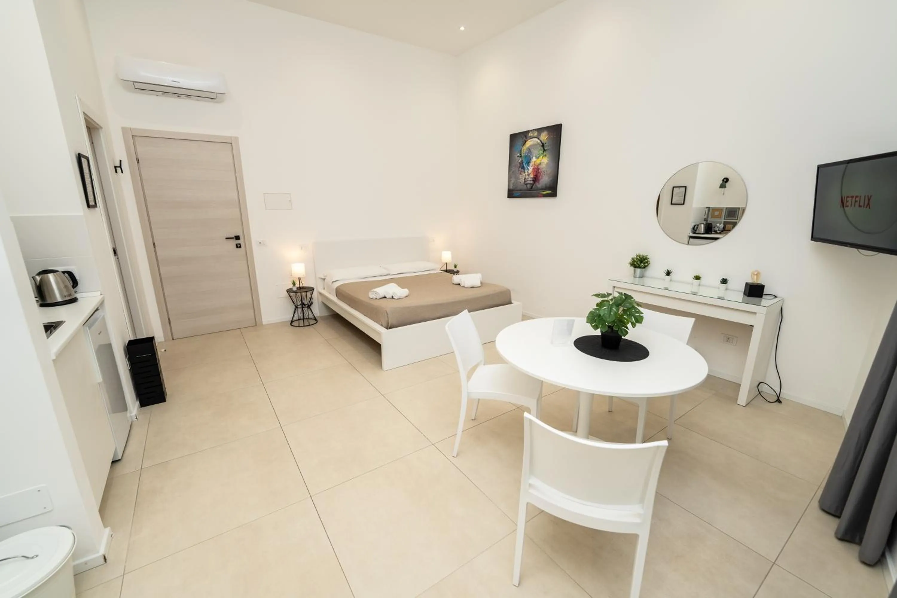 Bed in Valguarnera Studio Apartments