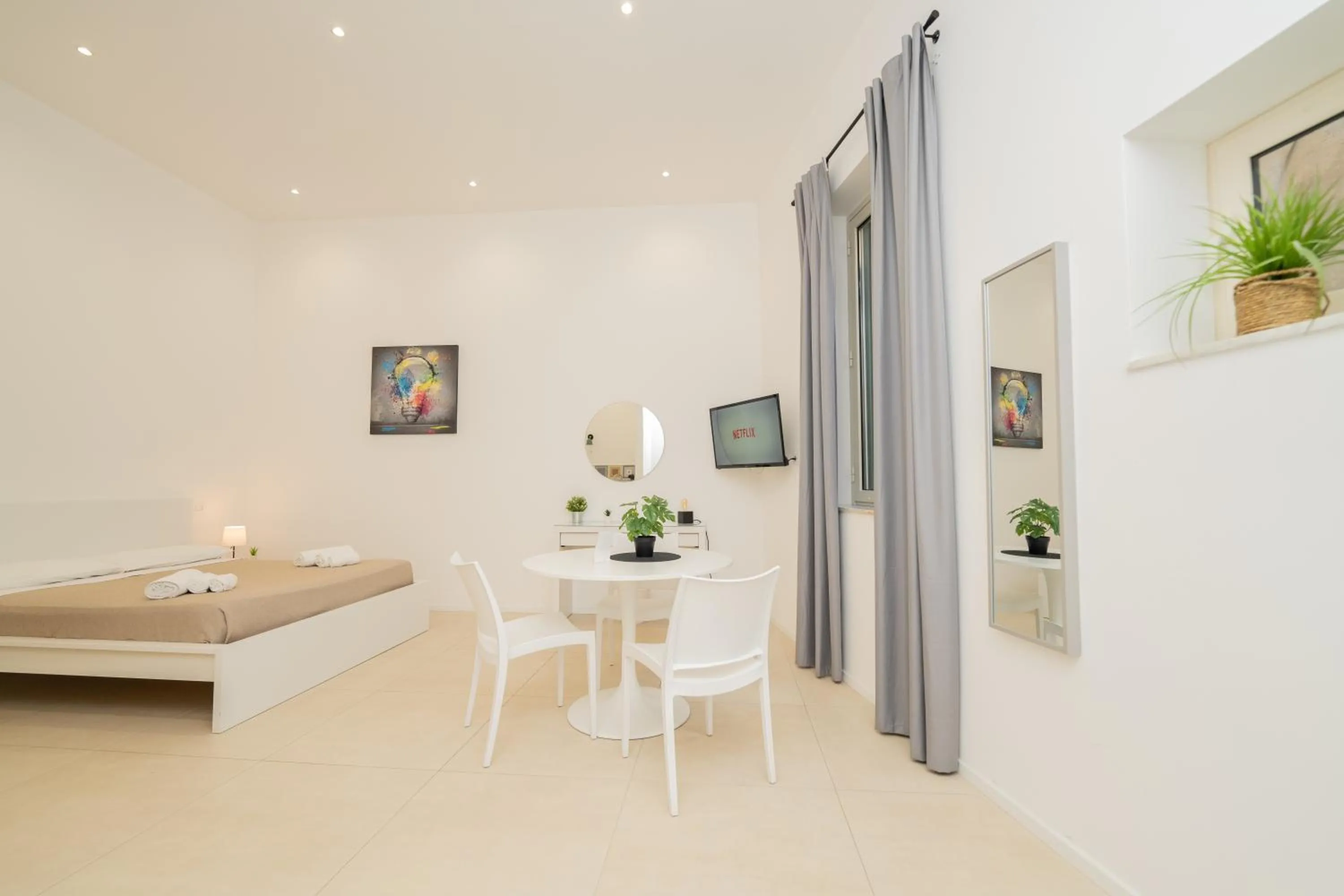 Bed in Valguarnera Studio Apartments