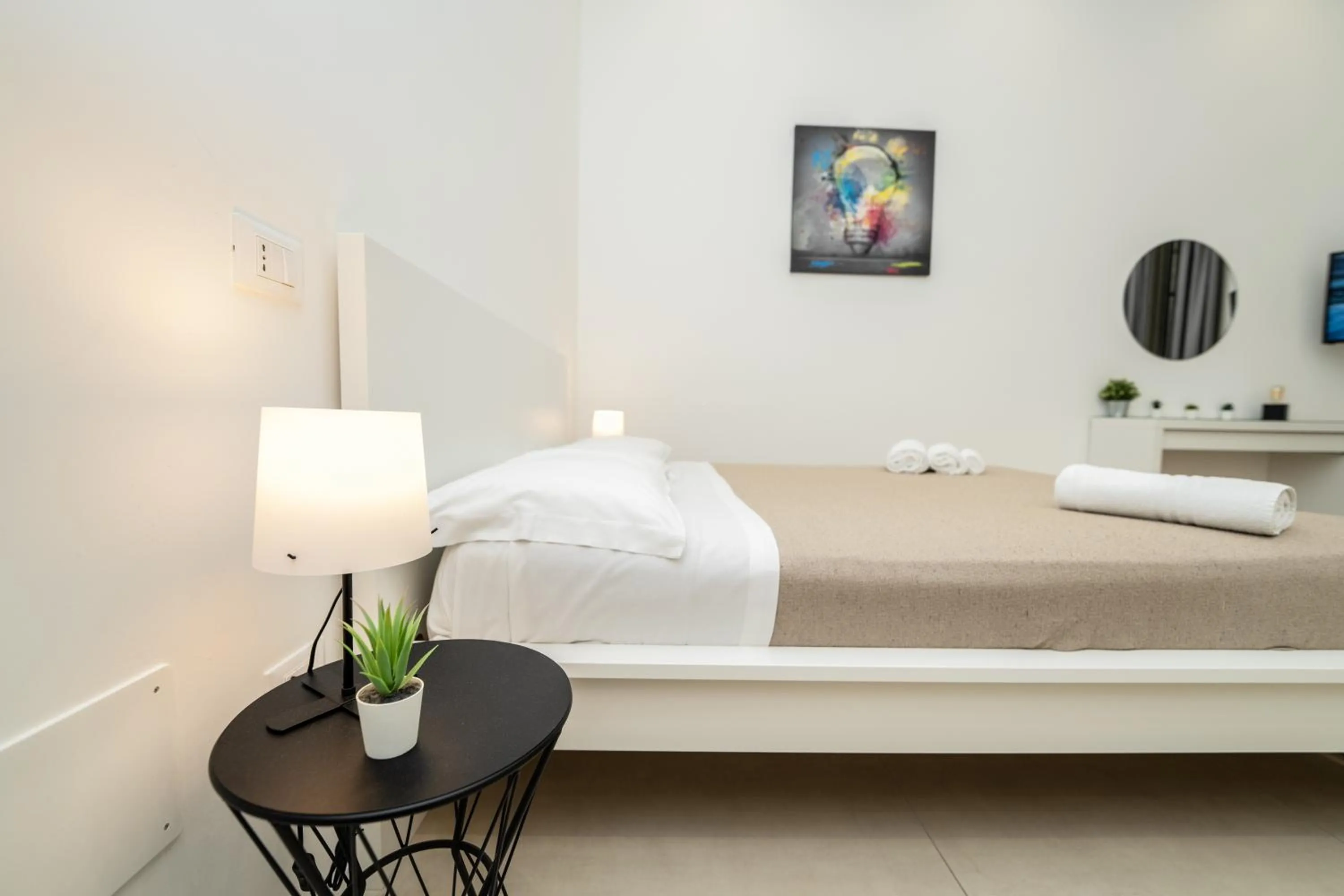 Bed in Valguarnera Studio Apartments