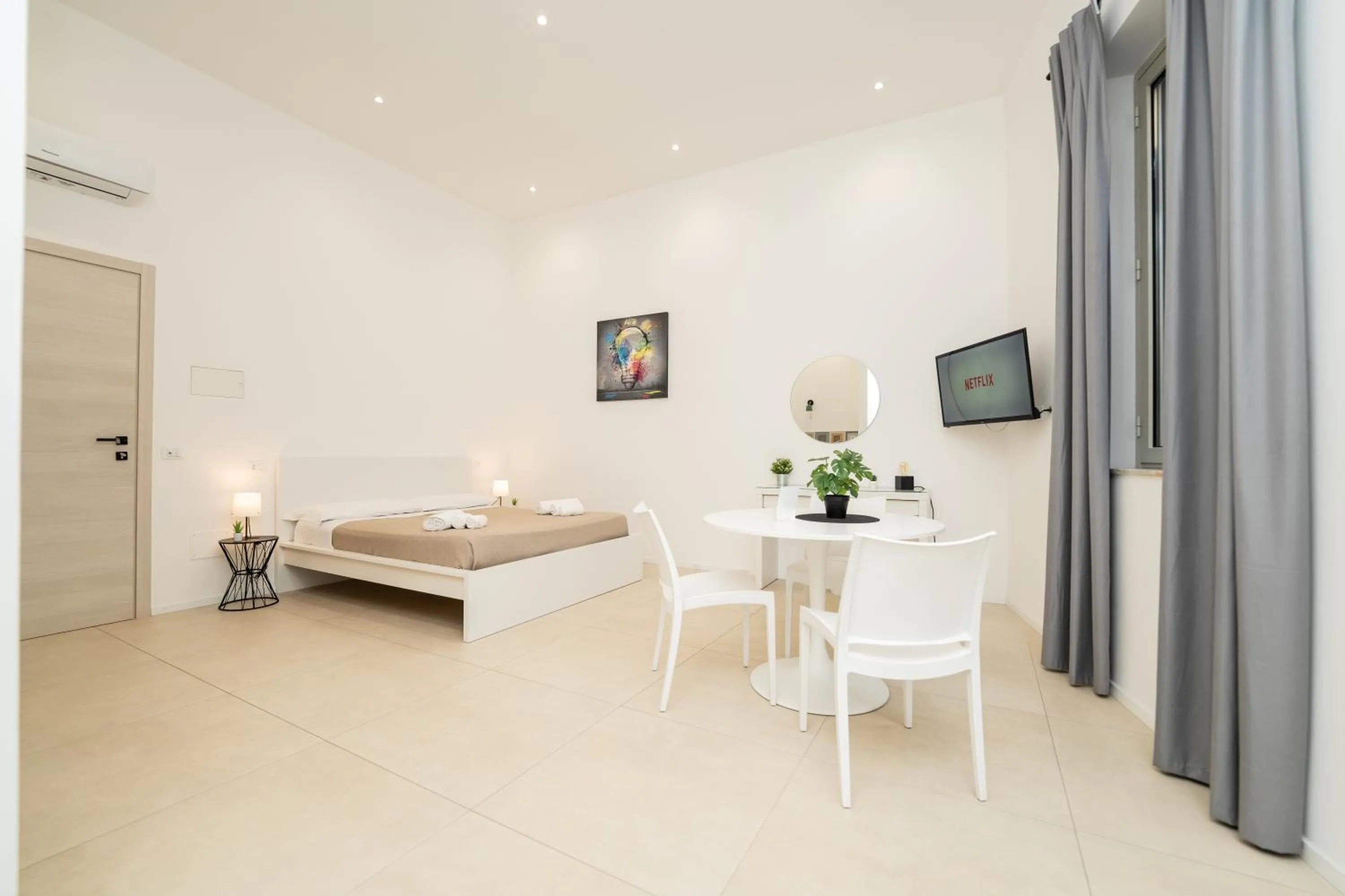 Bed in Valguarnera Studio Apartments