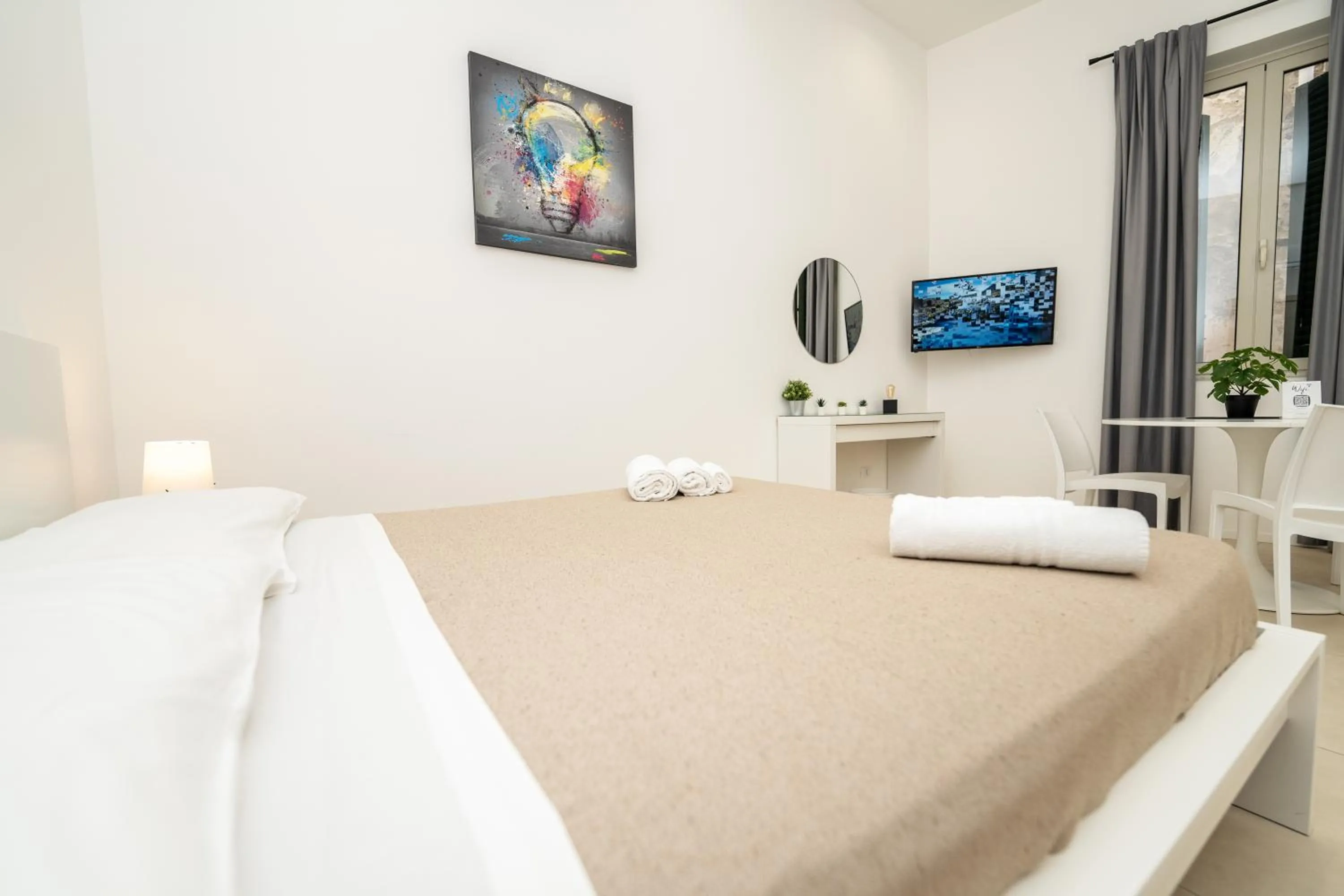 Bed in Valguarnera Studio Apartments