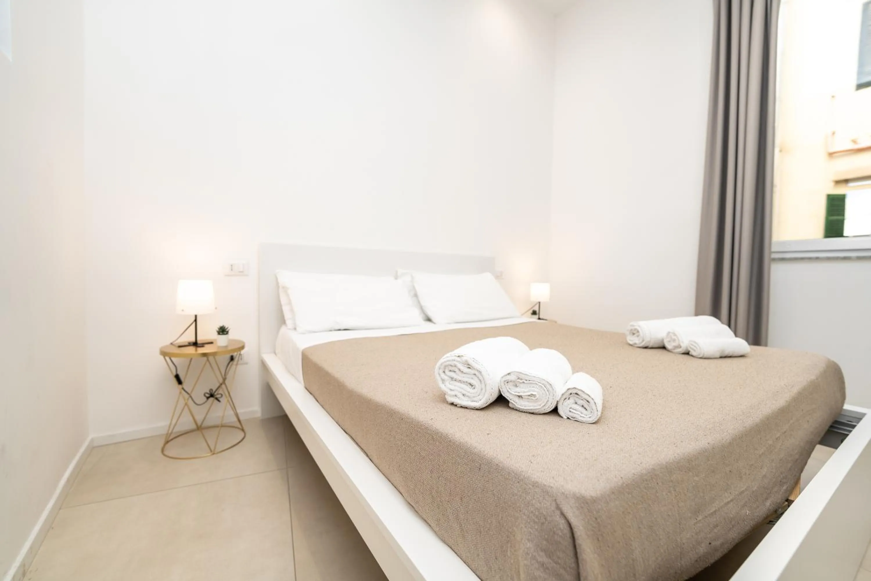 Bed in Valguarnera Studio Apartments