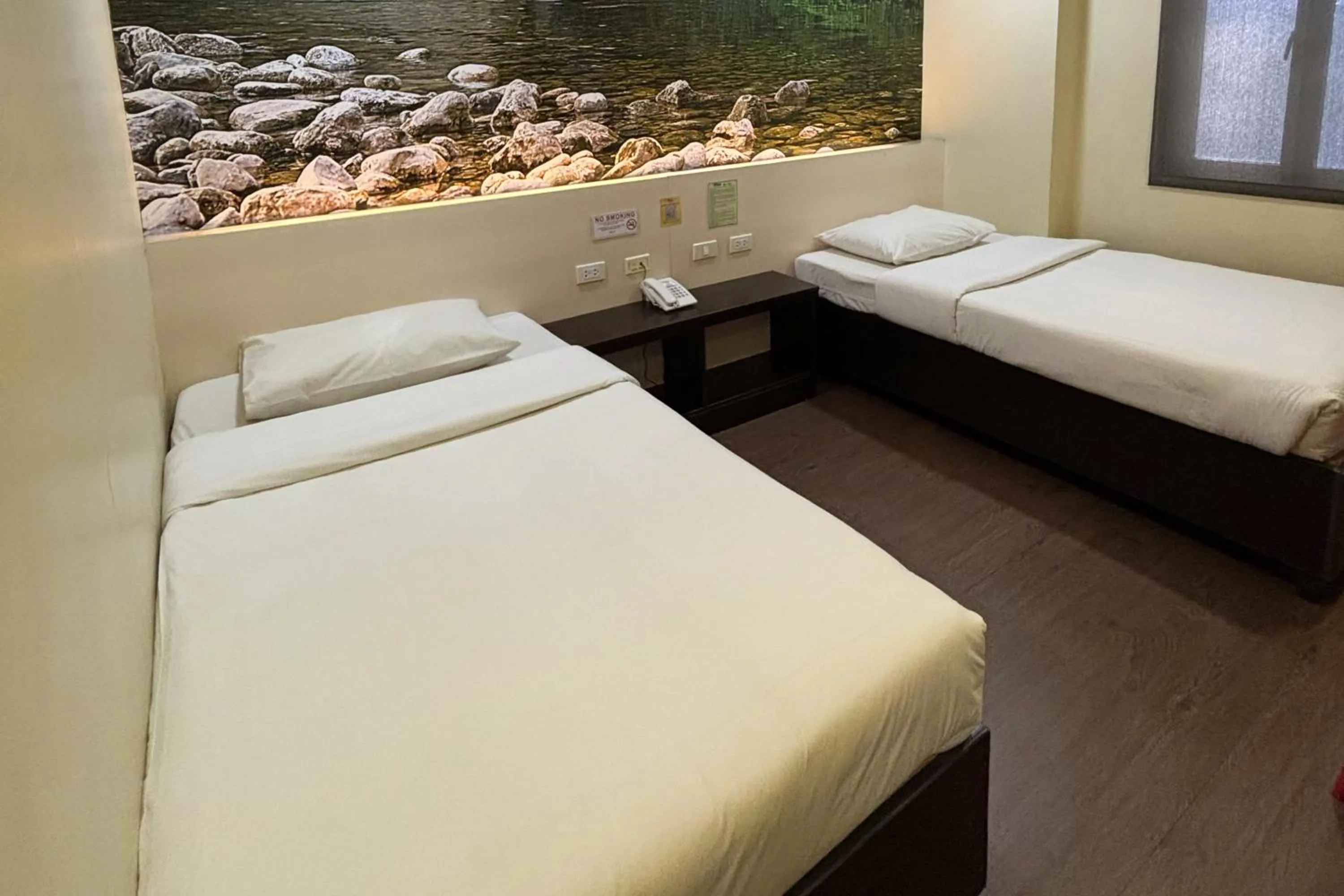 Bed in Sugbutel Family Hotel Cebu powered by Cocotel