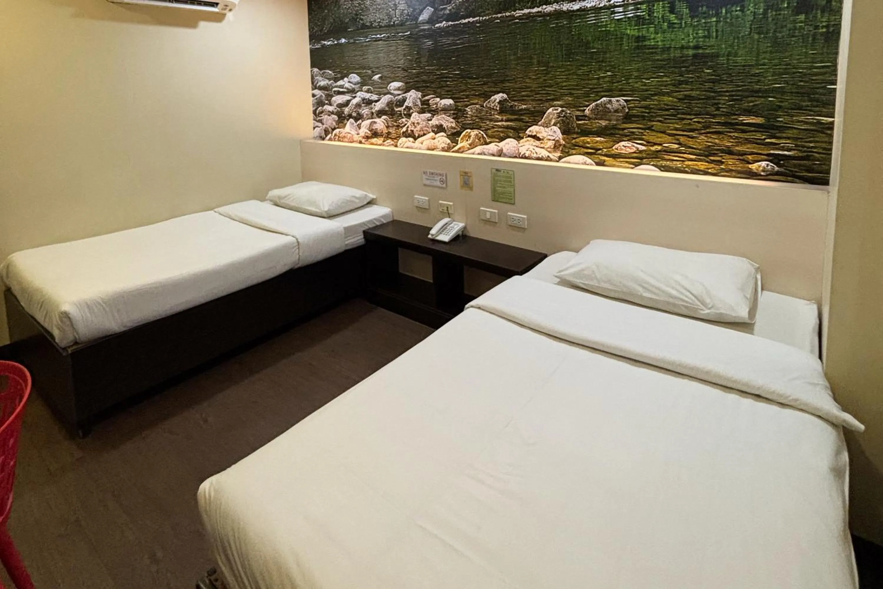 Bed in Sugbutel Family Hotel Cebu powered by Cocotel