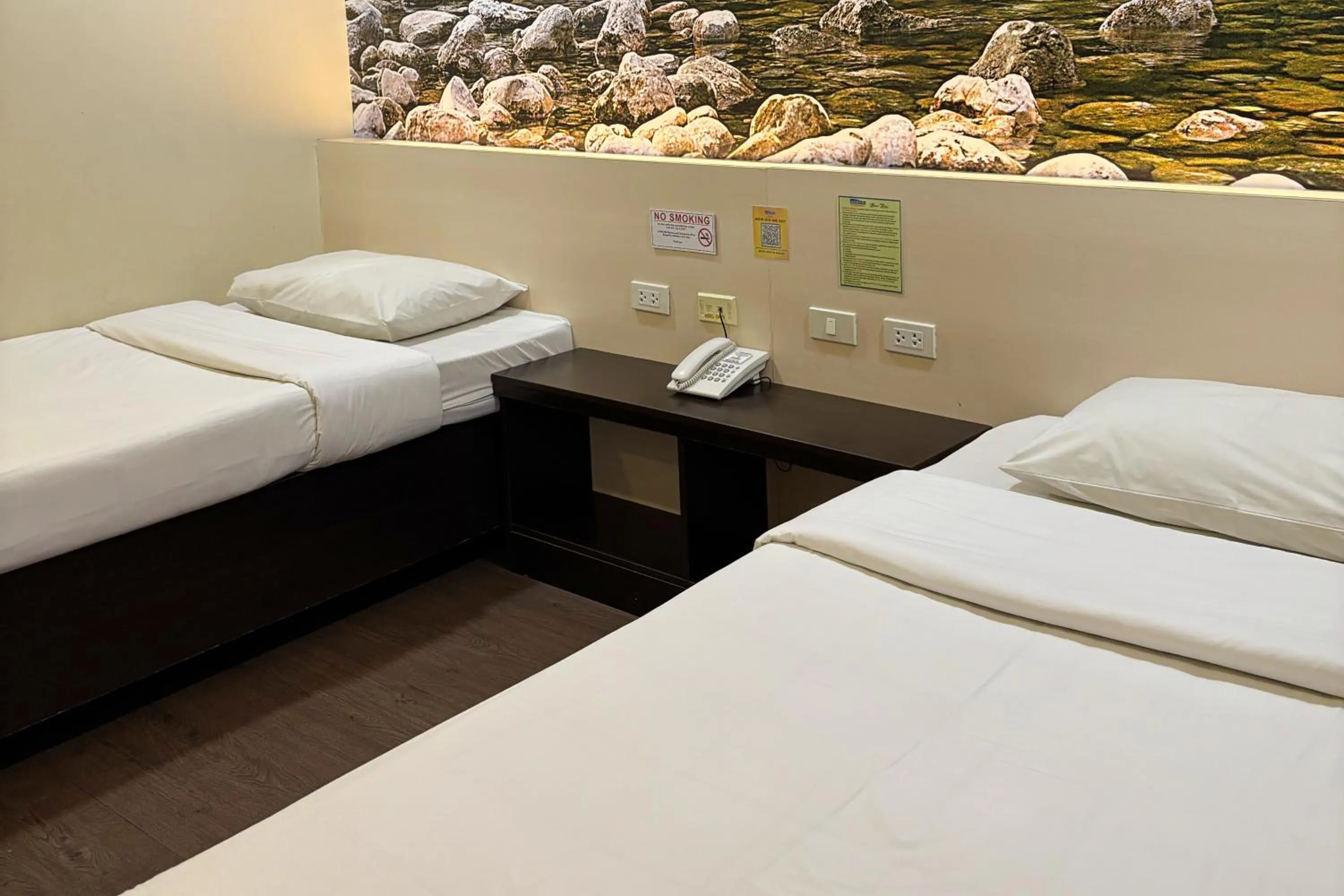 Bed in Sugbutel Family Hotel Cebu powered by Cocotel